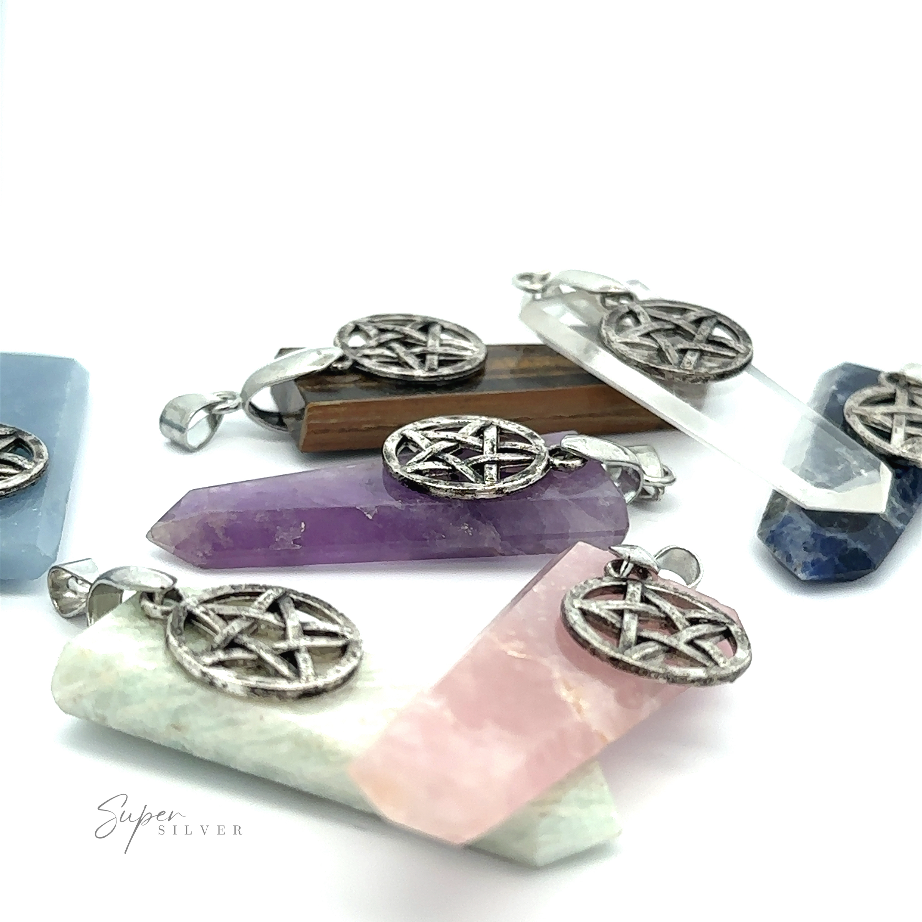 Pentagram Stone Slab Pendant with attached pentagram charms, displaying a variety of colors including purple, pink, and blue, set in mixed metals on a white background.