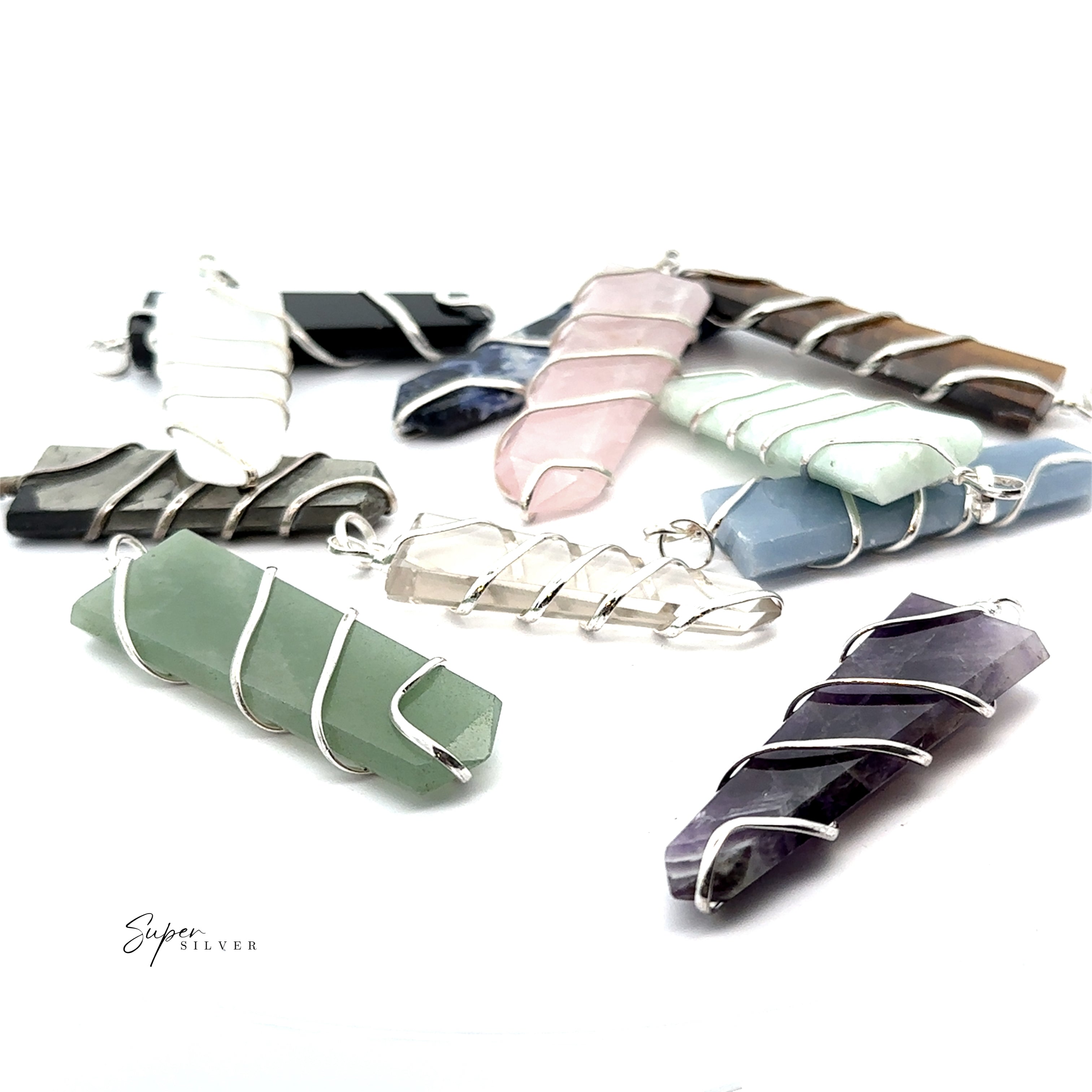 Wire Wrapped Slab Pendants in assorted colors, each featuring silver accents and a unique wire wrapped design, displayed on a white background.