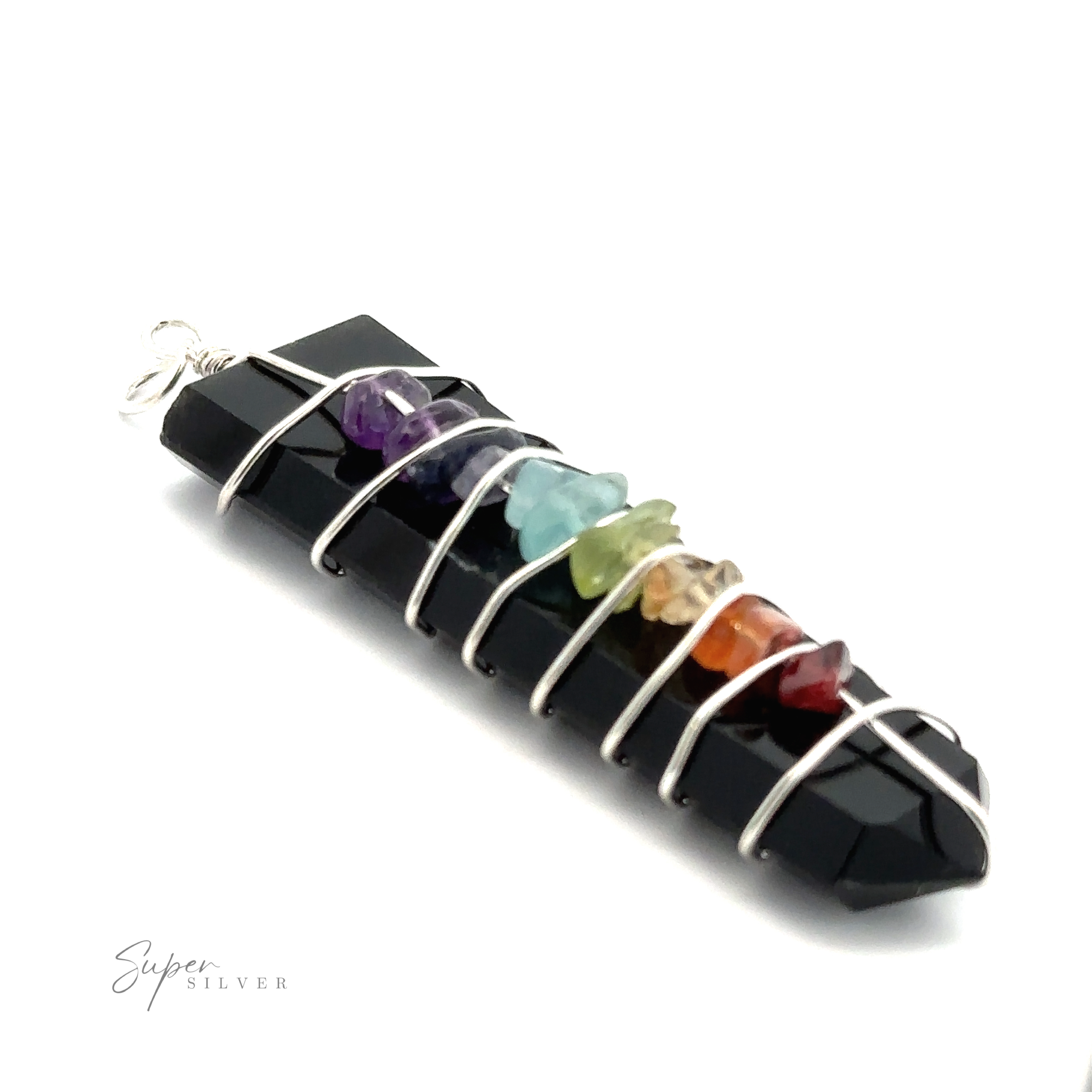 A Stone Slab Wire-Wrapped Chakra Pendant wrapped with silver wire, featuring small colorful chakra stones arranged vertically along the wire. The stones represent various colors of the rainbow.
