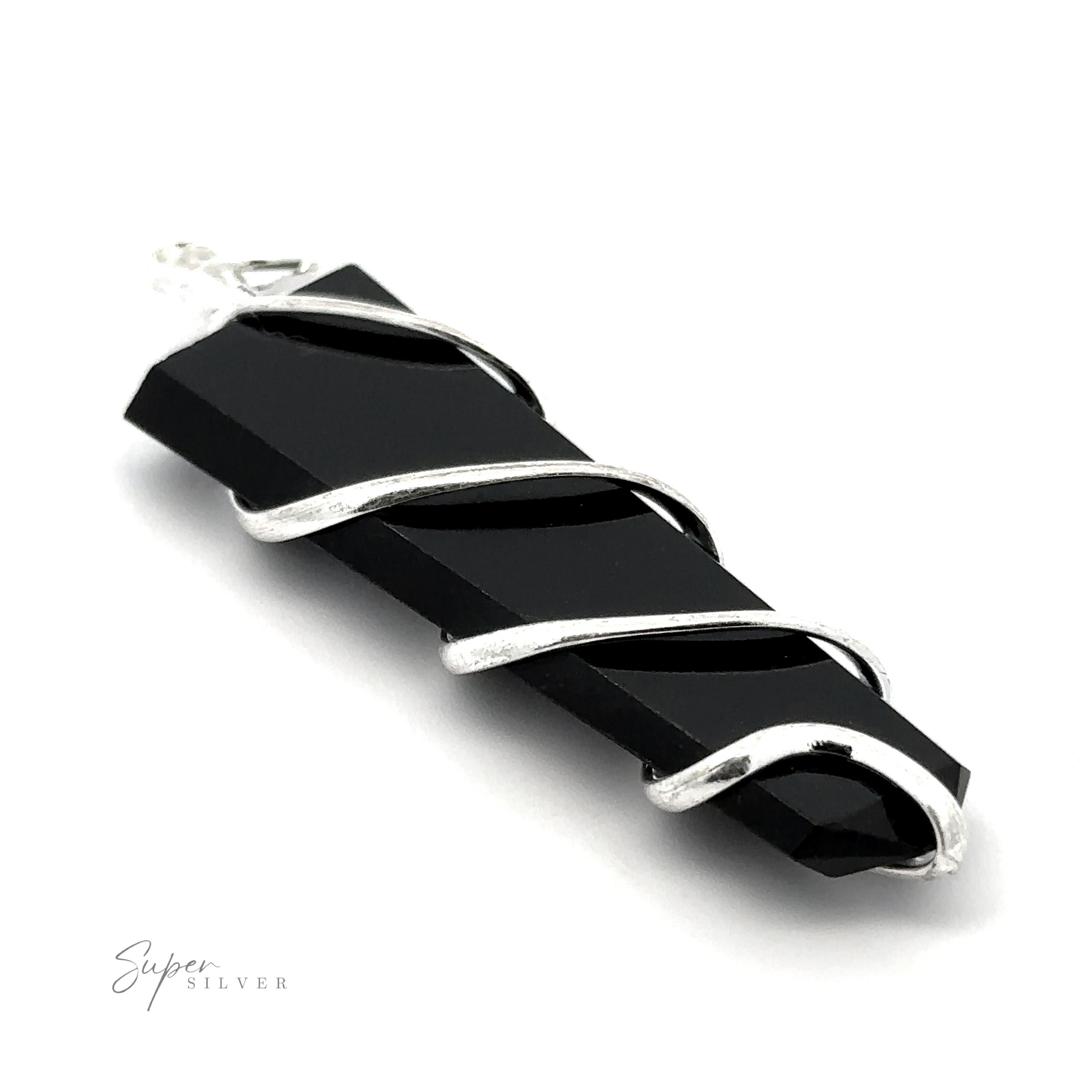A handcrafted Wire Wrapped Slab Pendant featuring a black gemstone, elegantly encased in silver wire with a bail for attachment. The background is pristine white, and "Super Silver" is subtly inscribed at the lower left corner, enhancing the allure of this exquisite piece of gemstone jewelry.