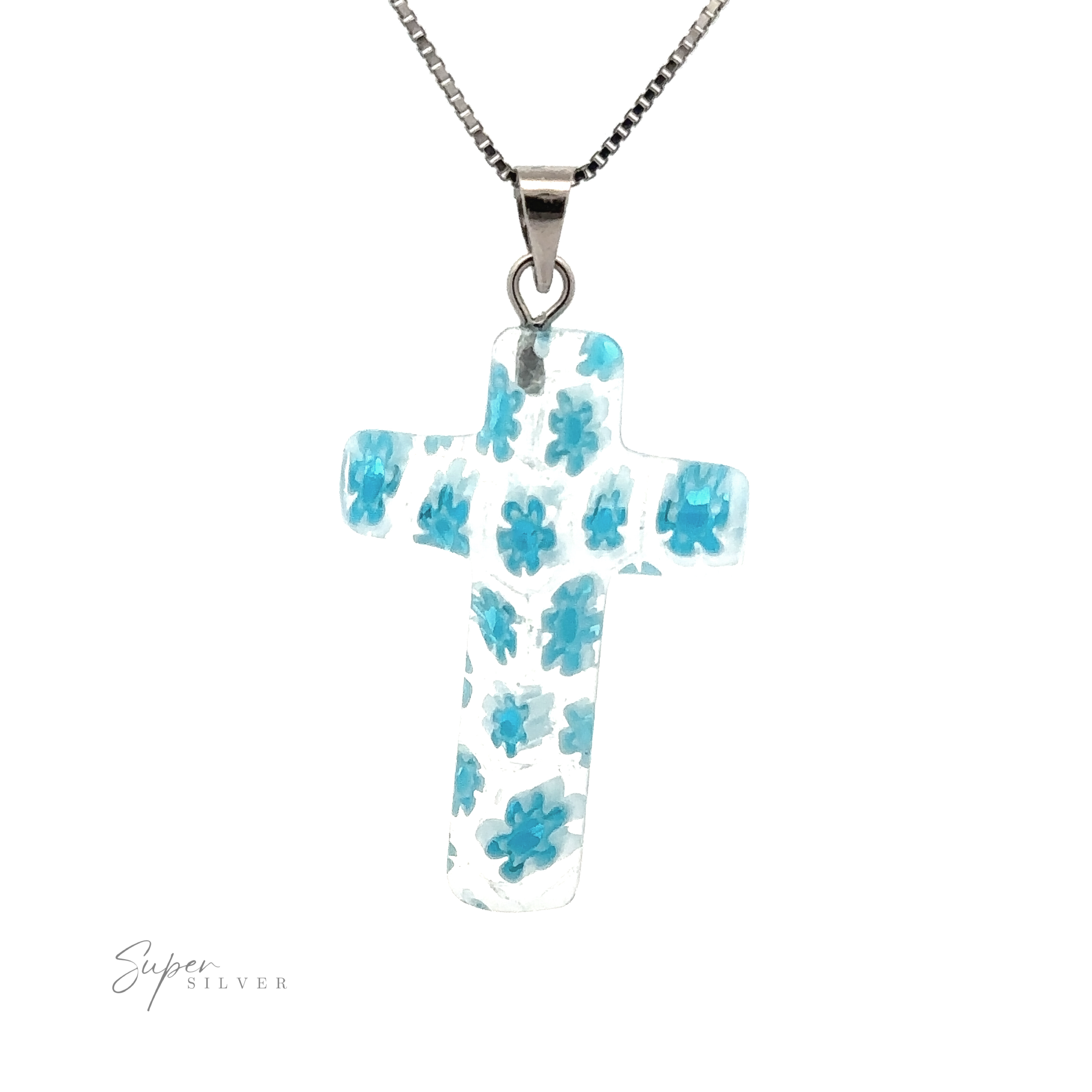 A Cross Pendant with Flower Pattern, hanging on a chain.