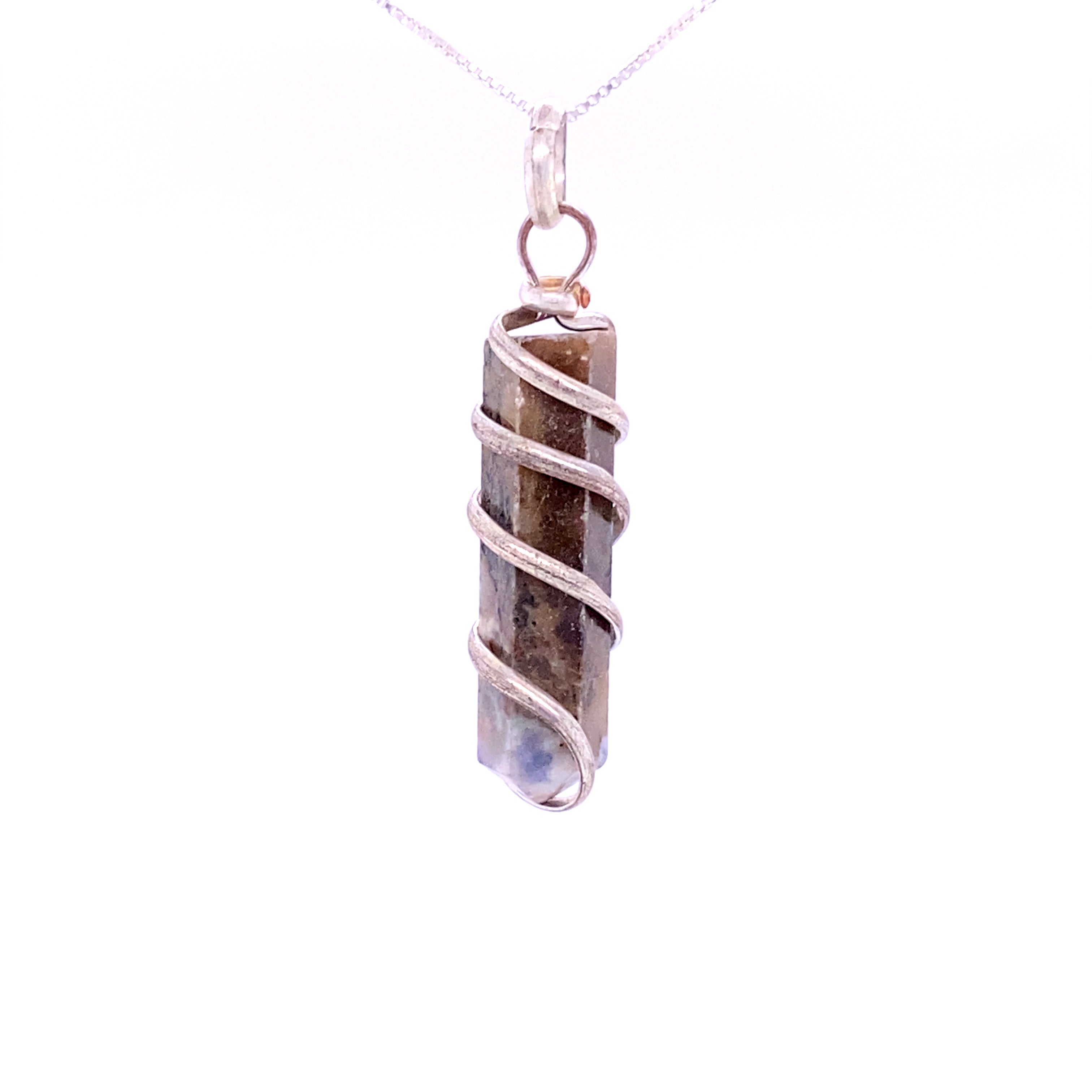 A **Wire Wrapped Stone Pendant** featuring a genuine cylindrical gemstone encased in silver wire, suspended from a delicate chain.