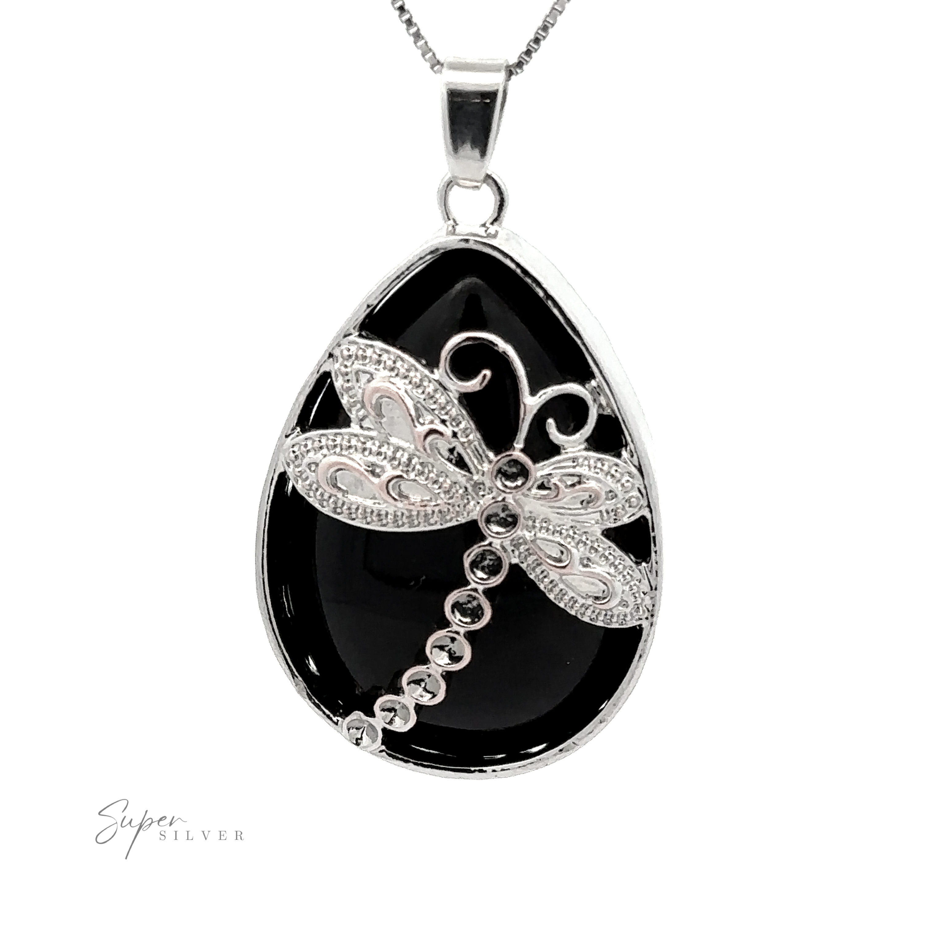 A Teardrop Stone pendant with Dragonfly featuring an ornate dragonfly design on a black teardrop-shaped stone background with a silver chain. Accented with hints of mixed metals, the word "Super Silver" is visible in the corner.