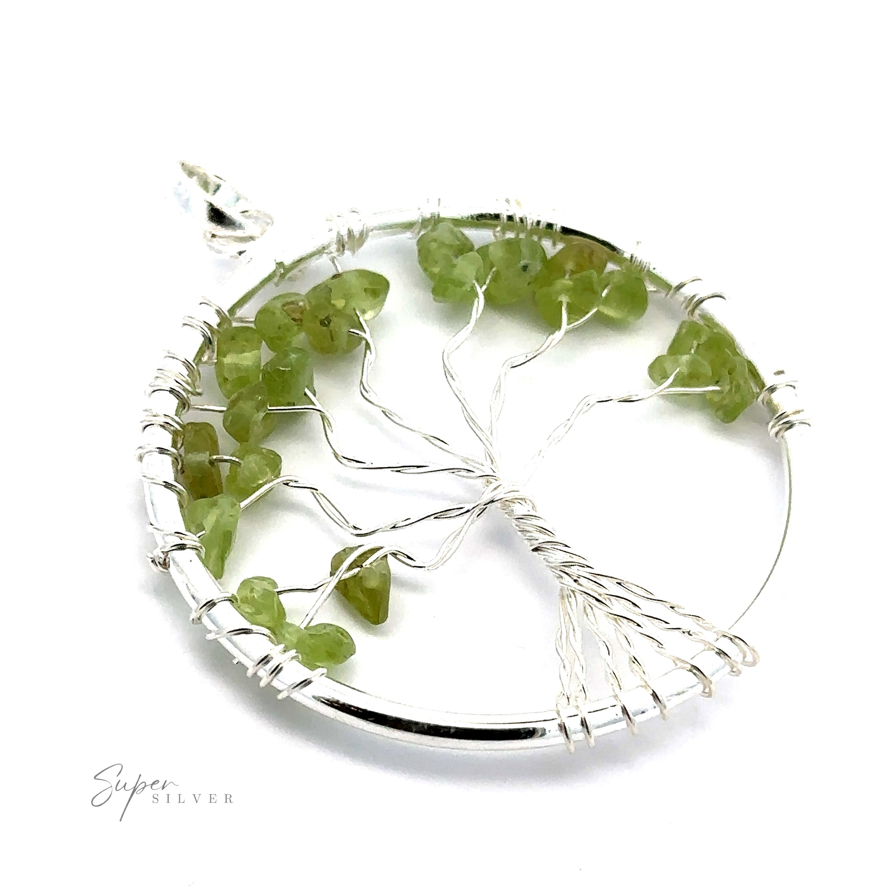 Wire Wrapped Tree of Life Pendant with Stones adorned with green gemstone chips, beautifully forming the shape of a tree within a circular frame.