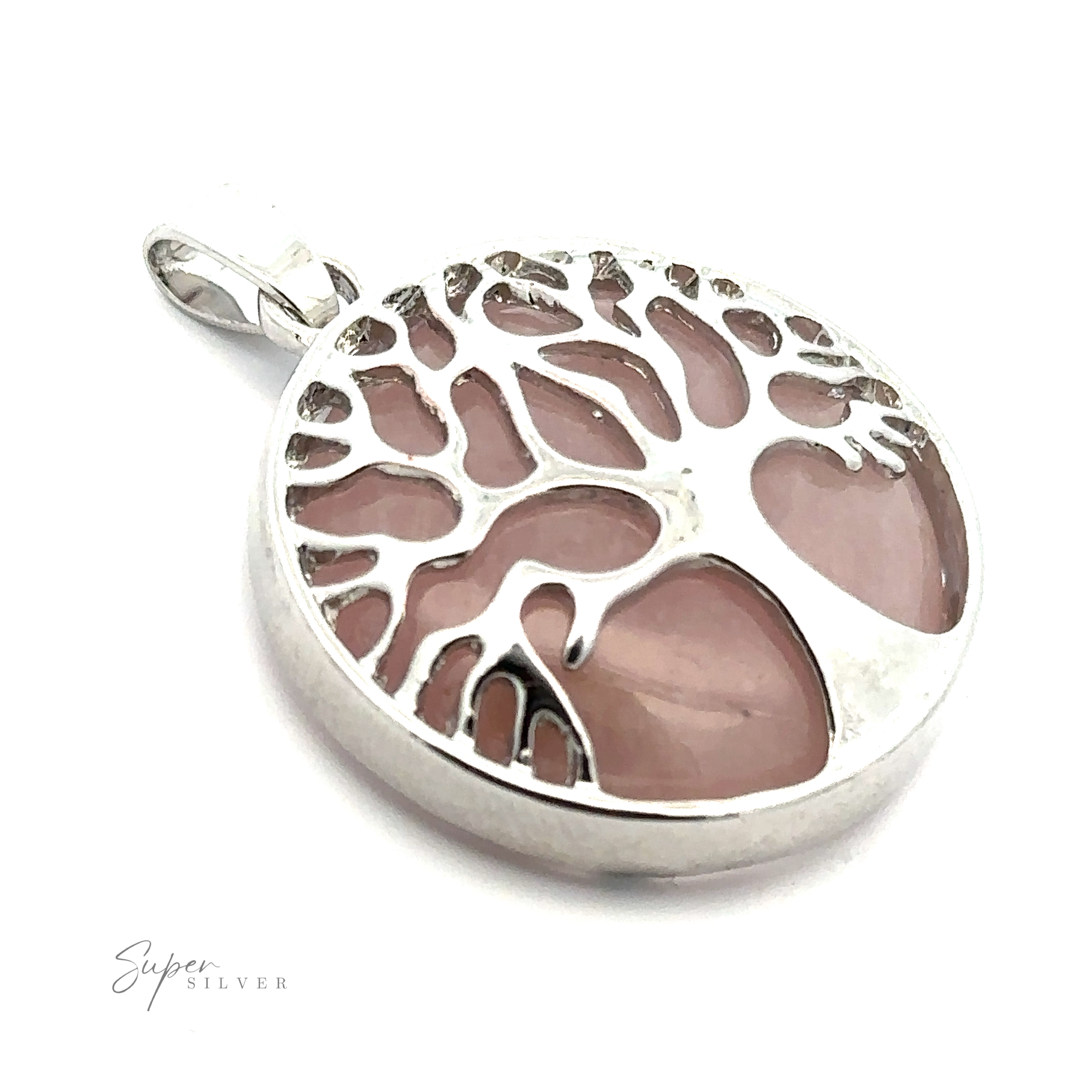 A round Tree of Life Pendant in silver-plated metal with a pink gemstone background. The base of the pendant has "Super Silver" inscribed on it.