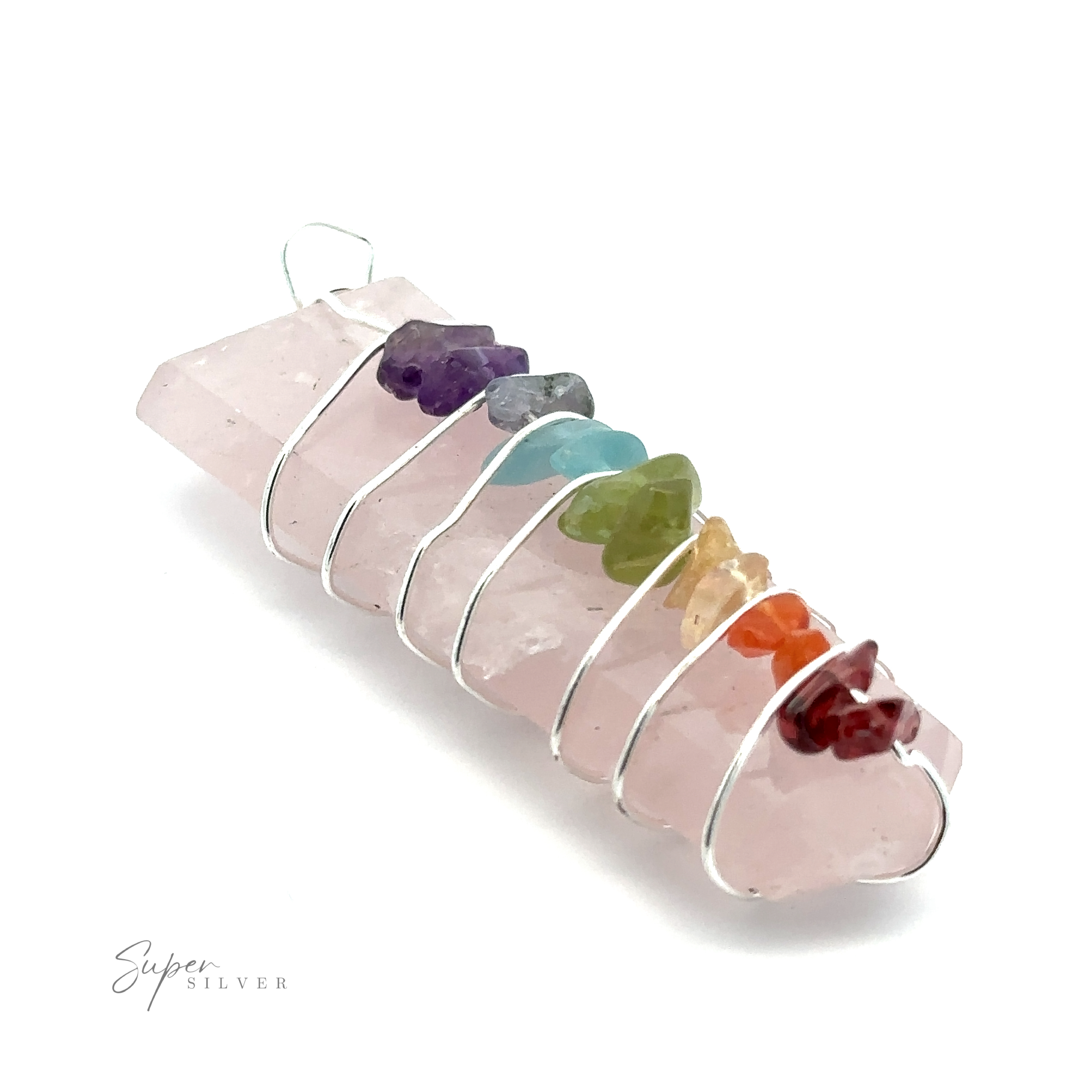 A Stone Slab Wire-Wrapped Chakra Pendant featuring a rose quartz base with seven small colored crystals aligned along its length, representing the seven chakras. This unique piece stands out among crystal pendants and beautifully incorporates chakra stones for a harmonious balance.