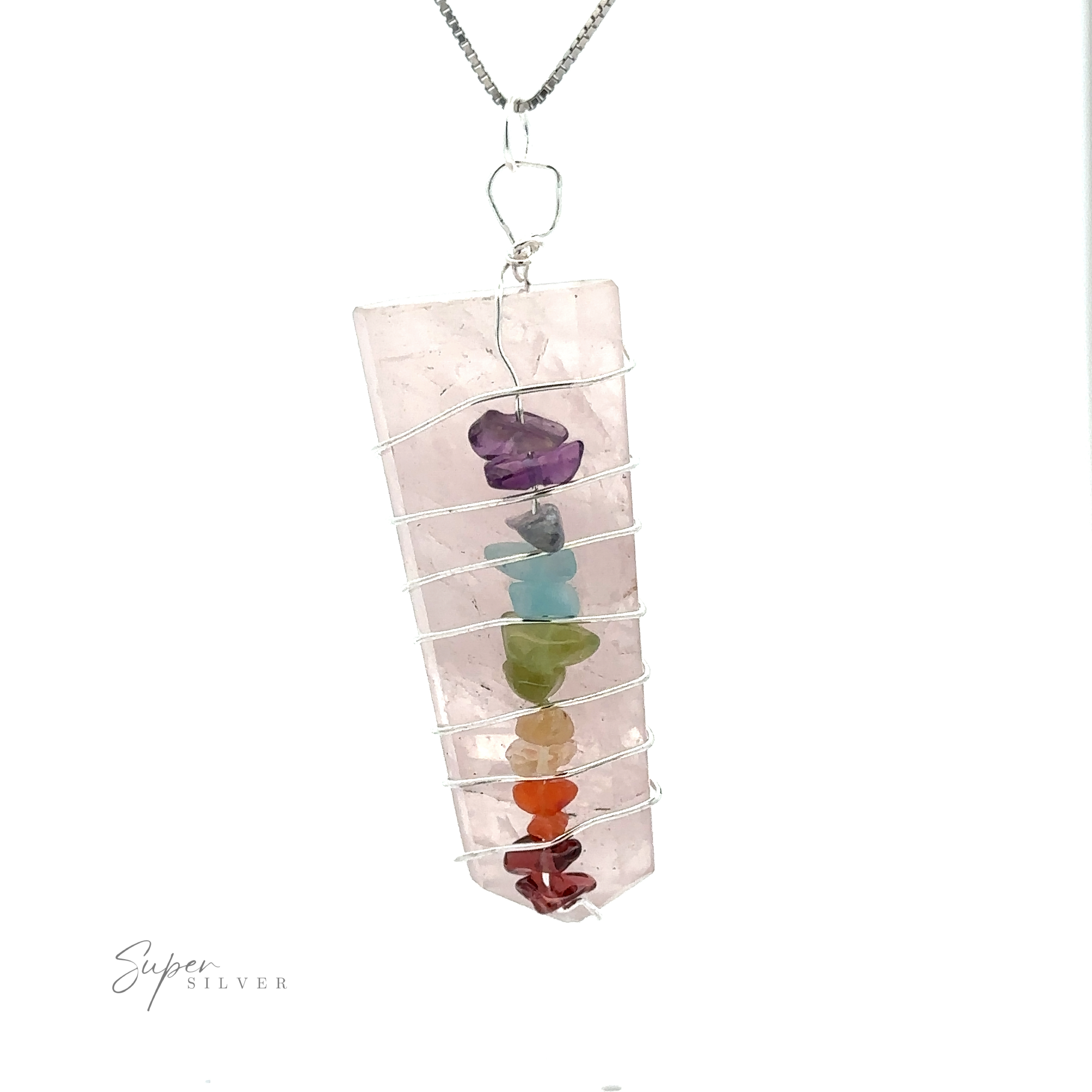 A Stone Slab Wire-Wrapped Chakra Pendant with a rectangular pink gemstone slab wrapped in silver wire, featuring seven small chakra stones running vertically along the wire. The pendant is attached to a silver chain.