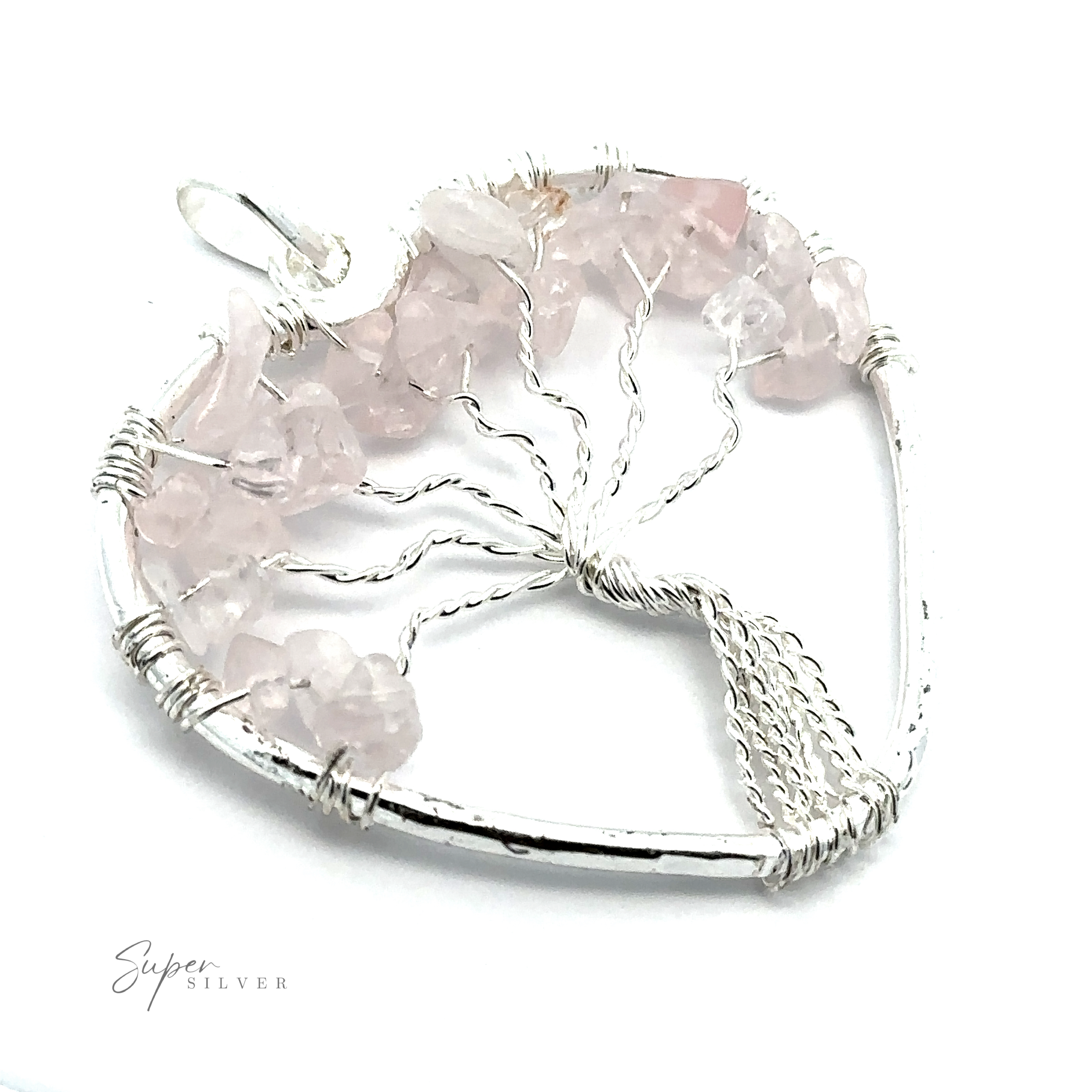 A silver Heart Shaped Tree of Life Pendant with raw stone beads of rose quartz gemstone chips, beautifully set in a heart-shaped frame.