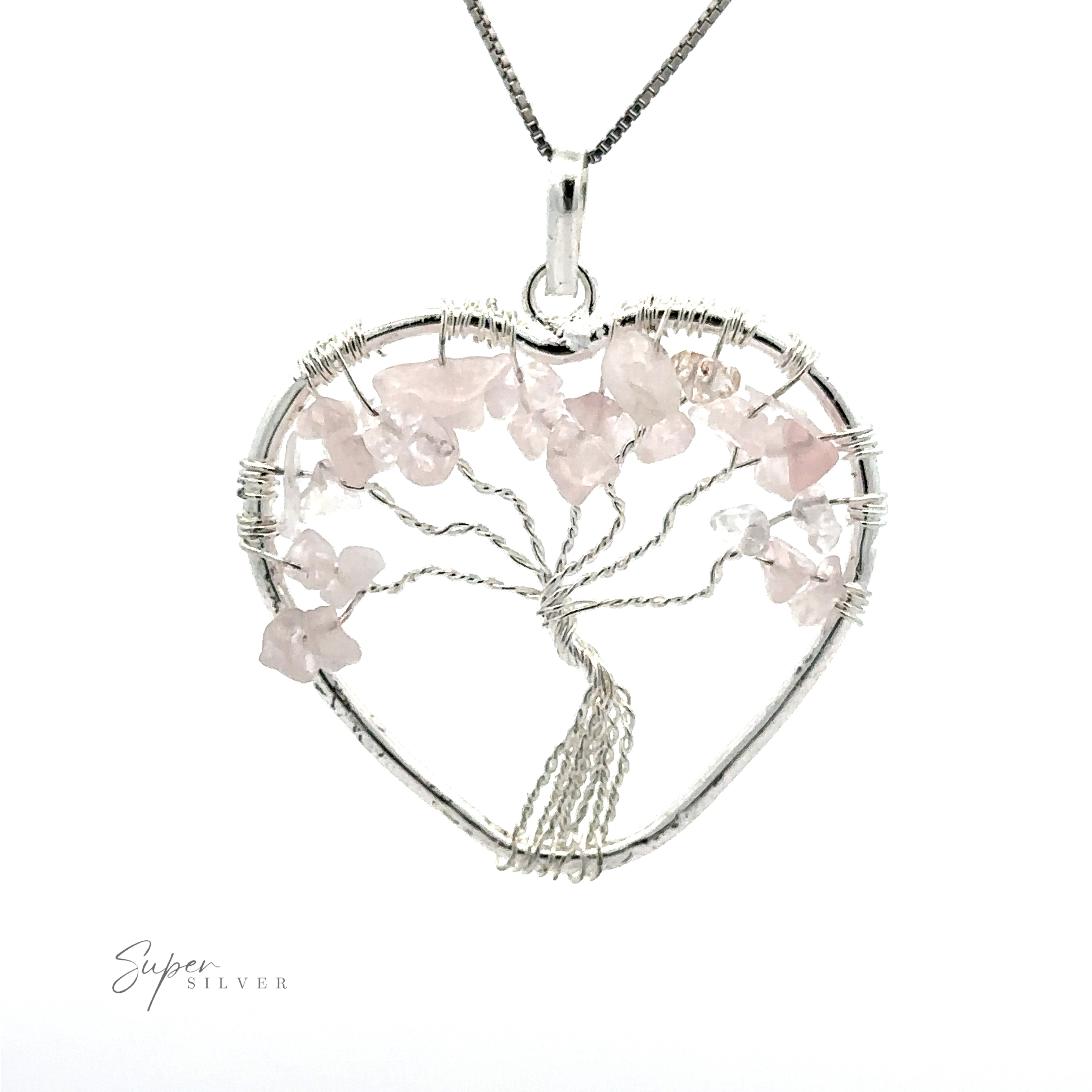 A Heart Shaped Tree of Life Pendant made of silver wire, adorned with pink crystals and complemented by raw stone beads on a silver chain.