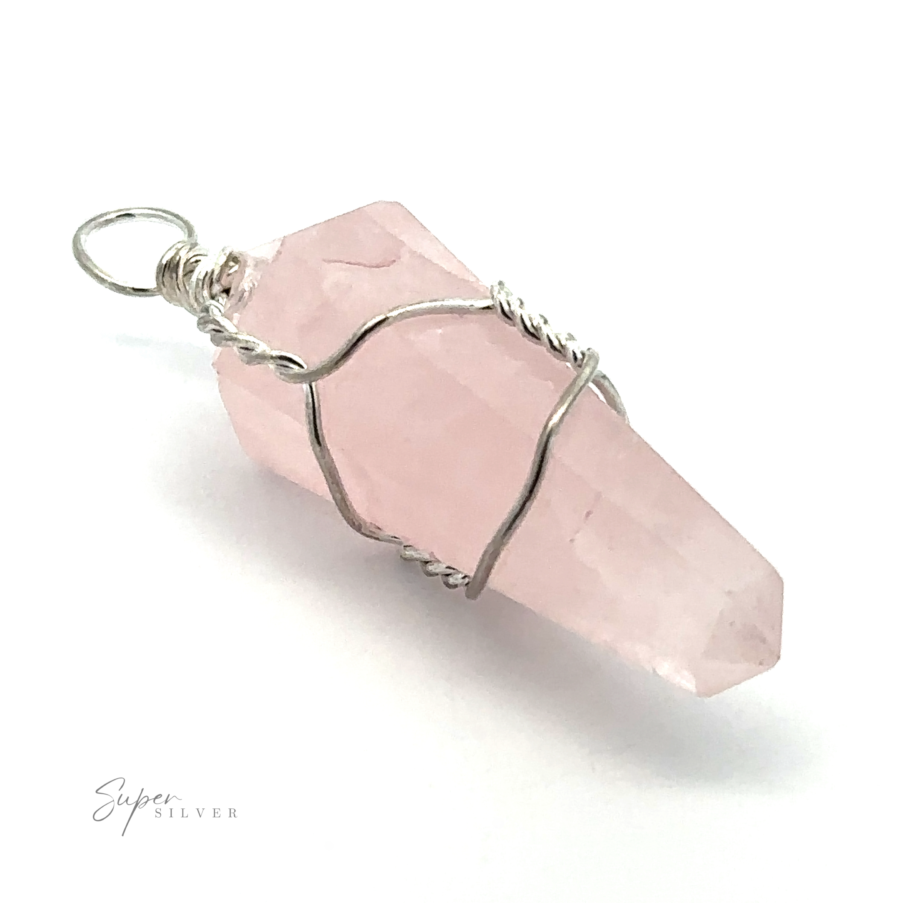 Close-up of a Wire-Wrapped Stone Pendant featuring a rose quartz crystal wrapped in silver wire, forming an elegant obelisk-shaped gemstone against a white background. The text "Super Silver" is visible in the bottom left corner.