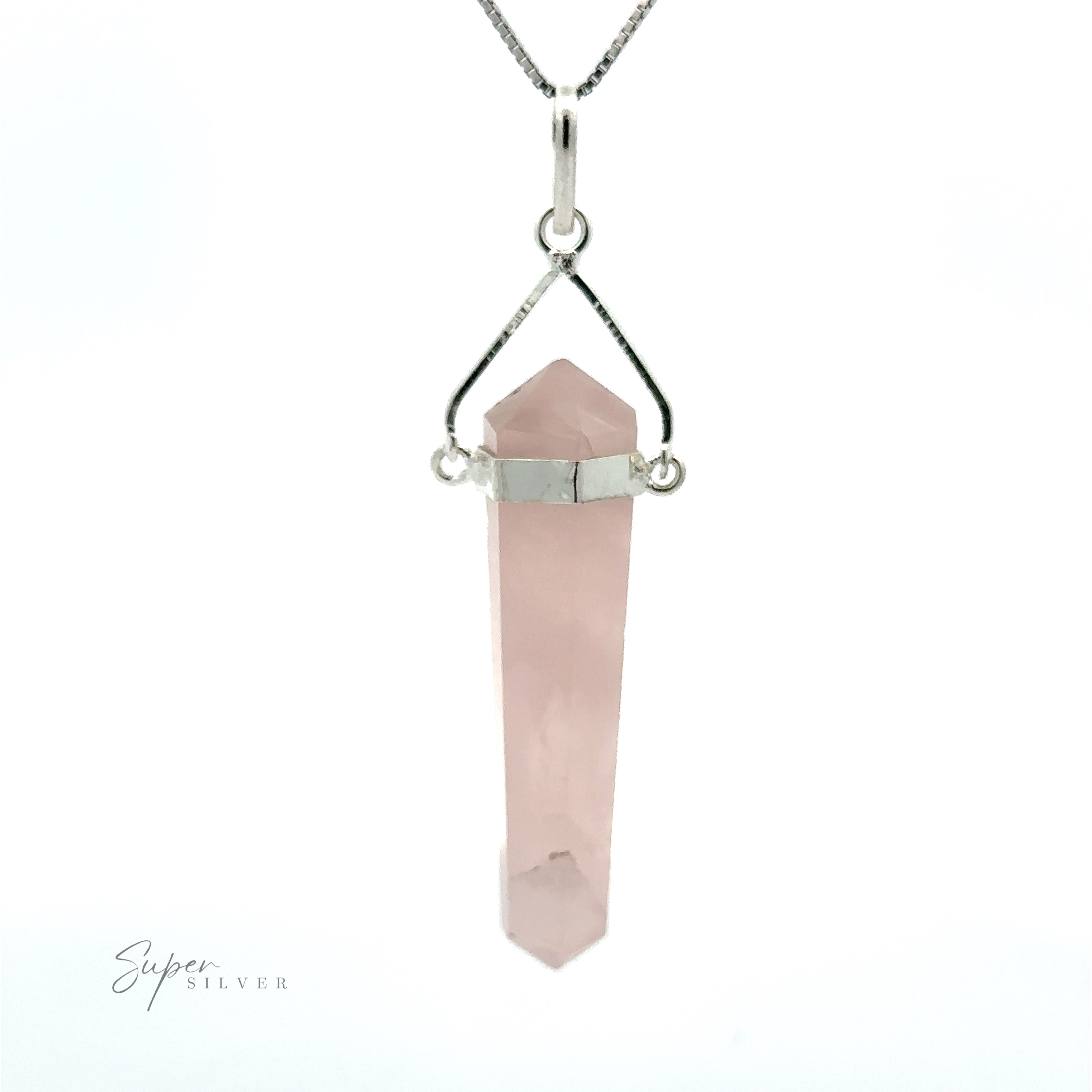 A Raw Stone Swivel Pendant featuring a pointed rose quartz pendant, set in a minimalist silver-plated setting with a small chain loop.