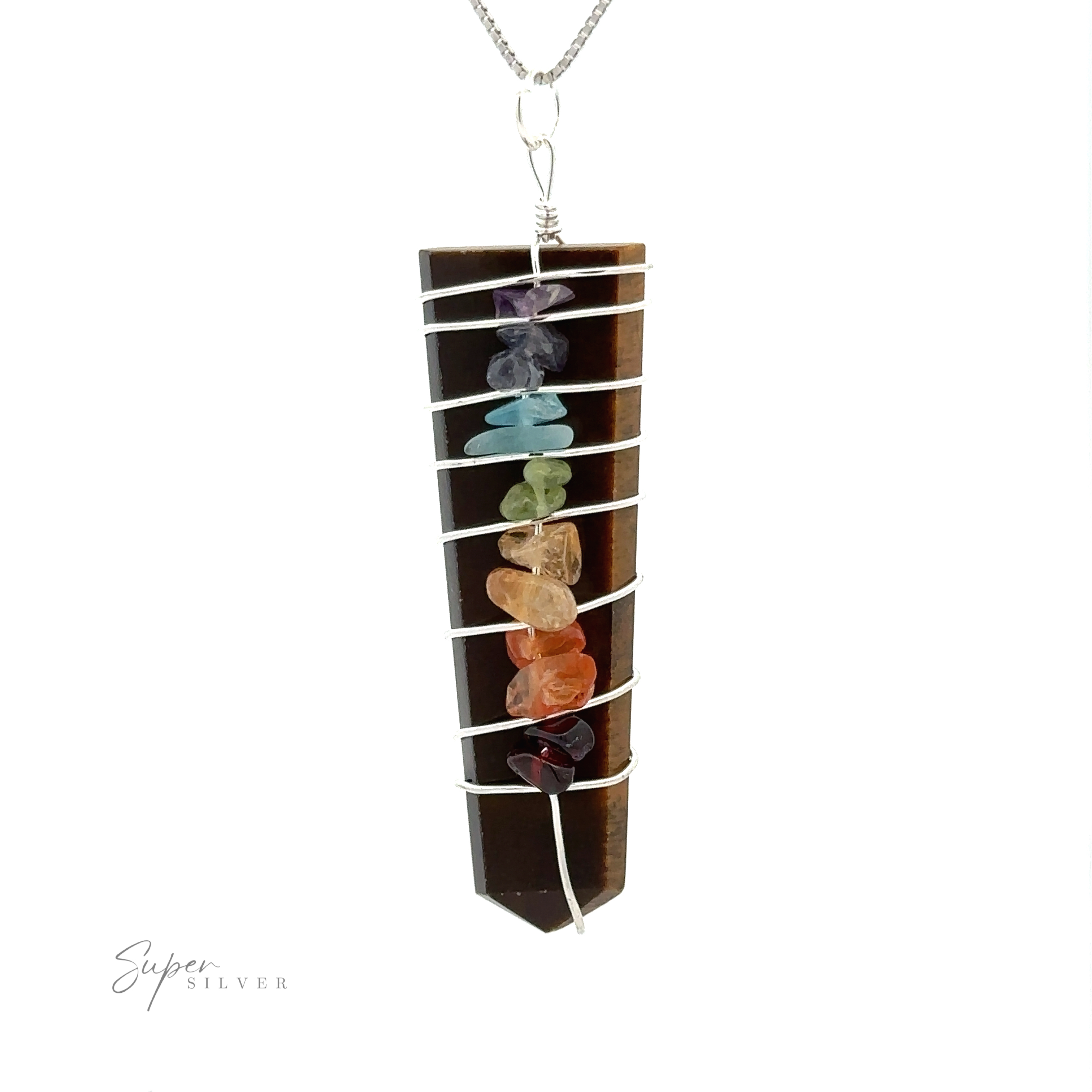 A Stone Slab Wire-Wrapped Chakra Pendant featuring multiple colorful gemstone slabs arranged vertically and wrapped with silver wire, hanging from a silver chain. The gemstones seem to represent the seven chakras.