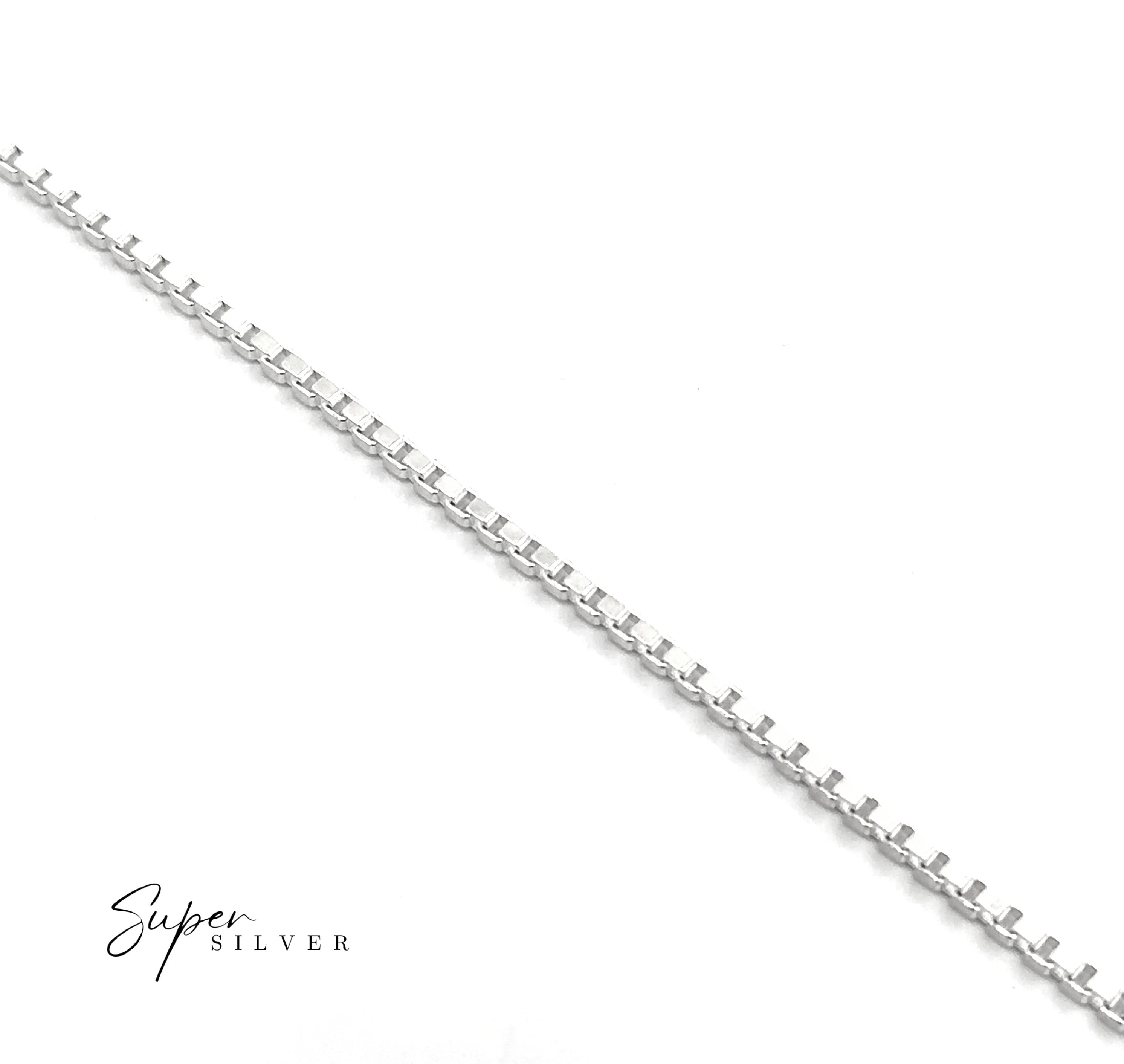 A close-up of the Bold Italian Box Chain—a sleek sterling silver necklace shown diagonally on a white background with "Super Silver" in the corner, highlighting its minimalist and elegant design.