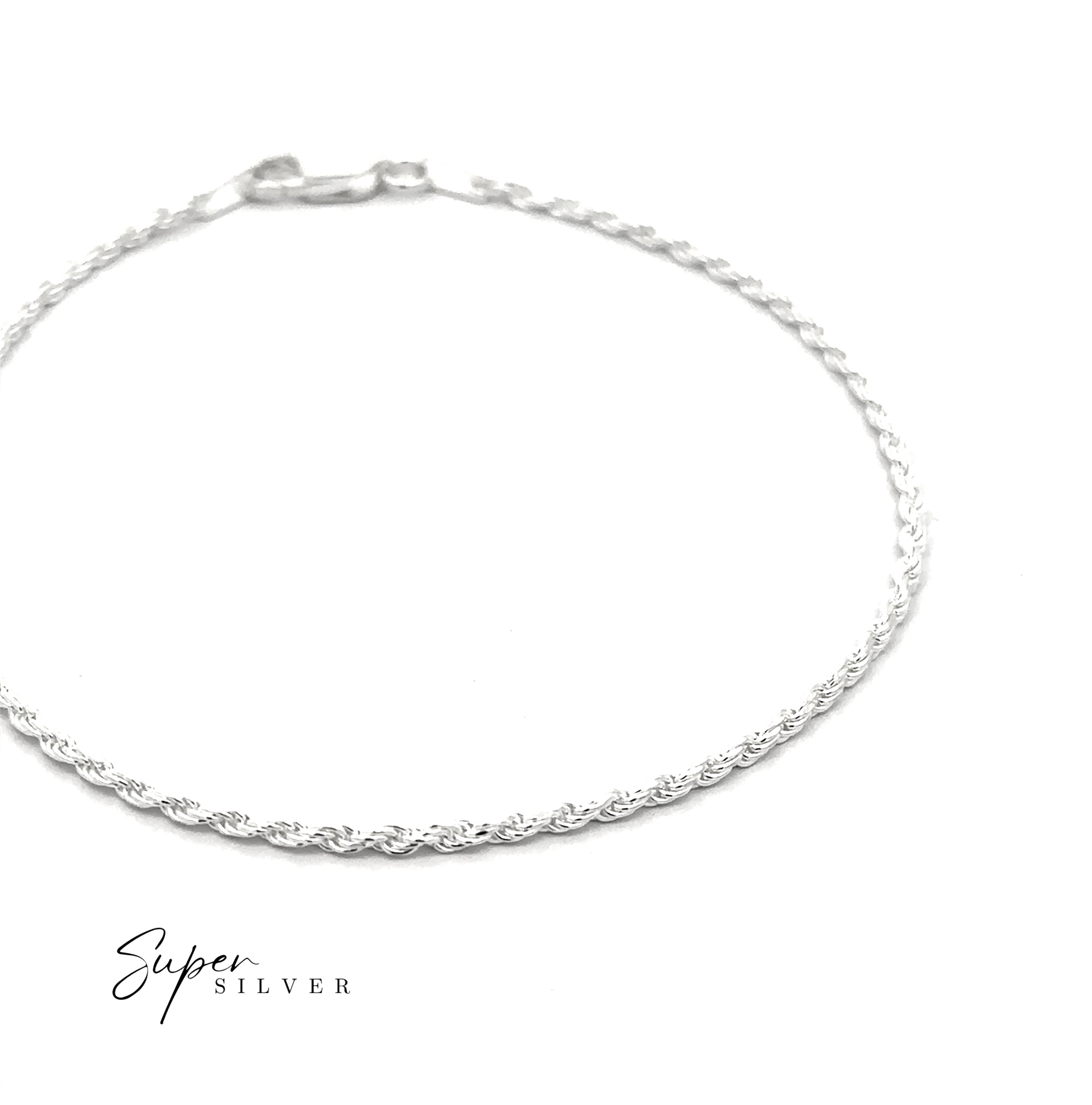 The Delicate Italian D/C Rope Chain bracelet, featuring a twisted silver faceted design and clasp, is showcased on a white background with the "Super Silver" logo in the lower left corner.