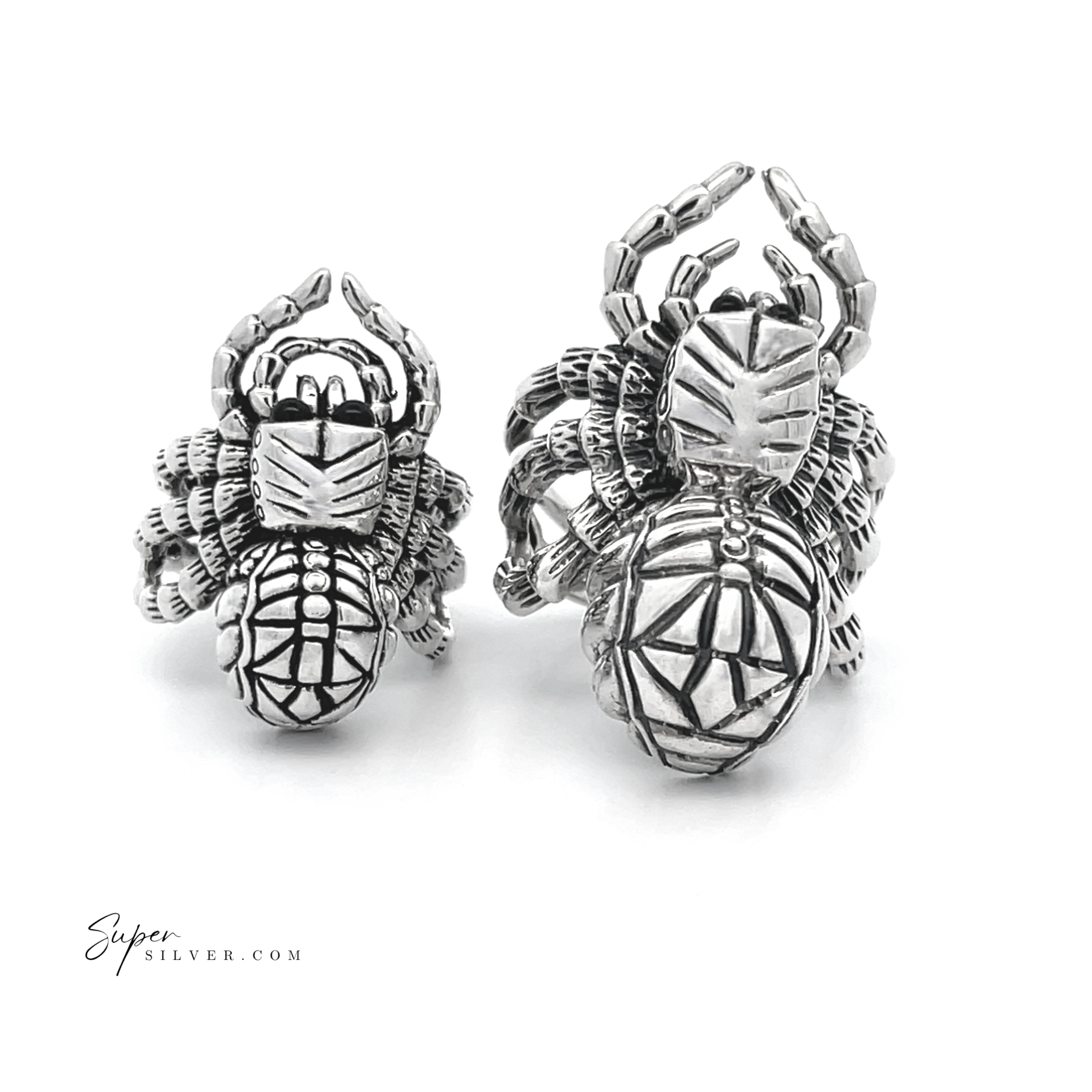 The Adjustable Statement Spider Rings, crafted from sterling silver and featuring intricate designs, are displayed on a white background to highlight the beauty of handcrafted jewelry.