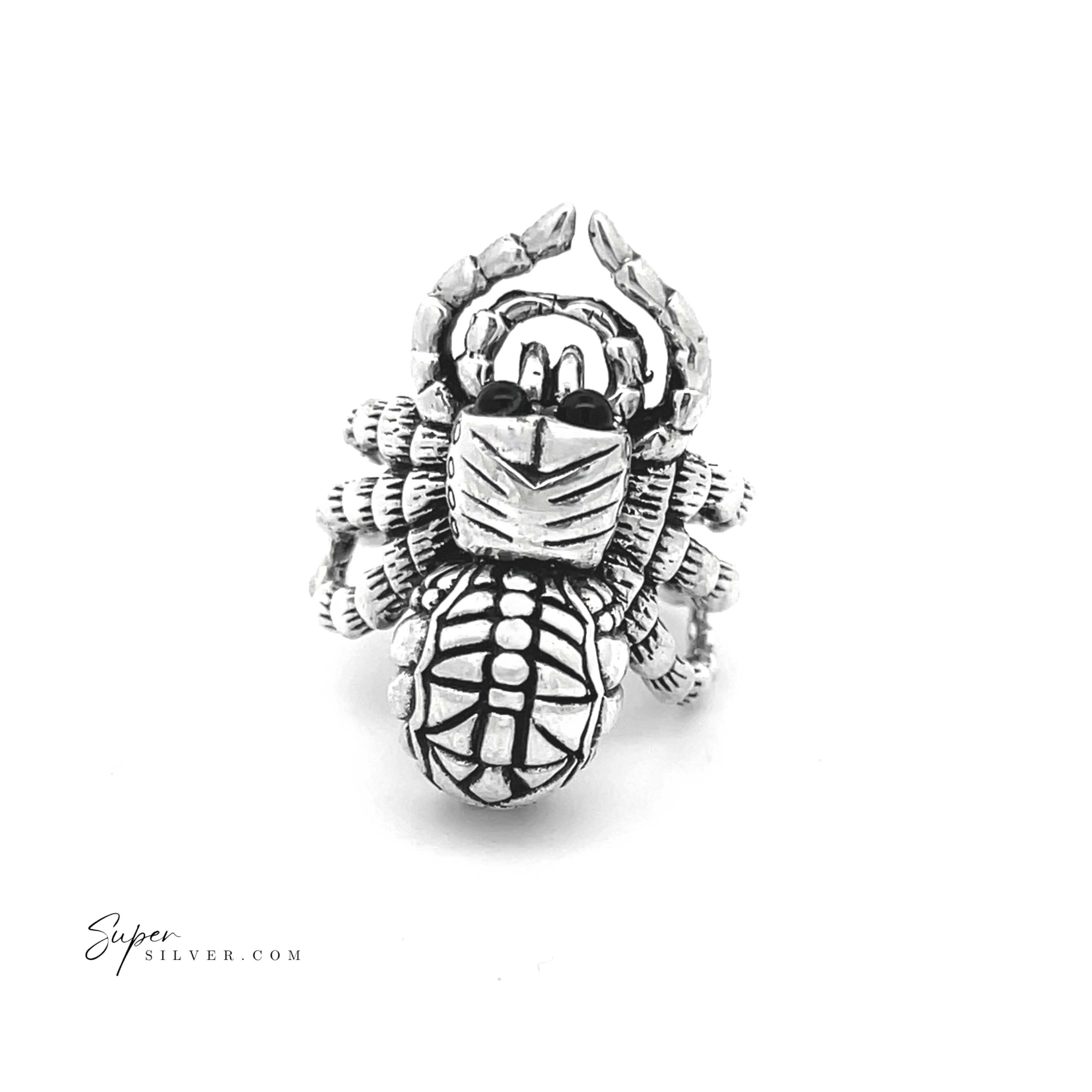 Adjustable statement spider ring with intricate textures and engravings, showcased on a white background, exemplifying the artistry of handcrafted jewelry.