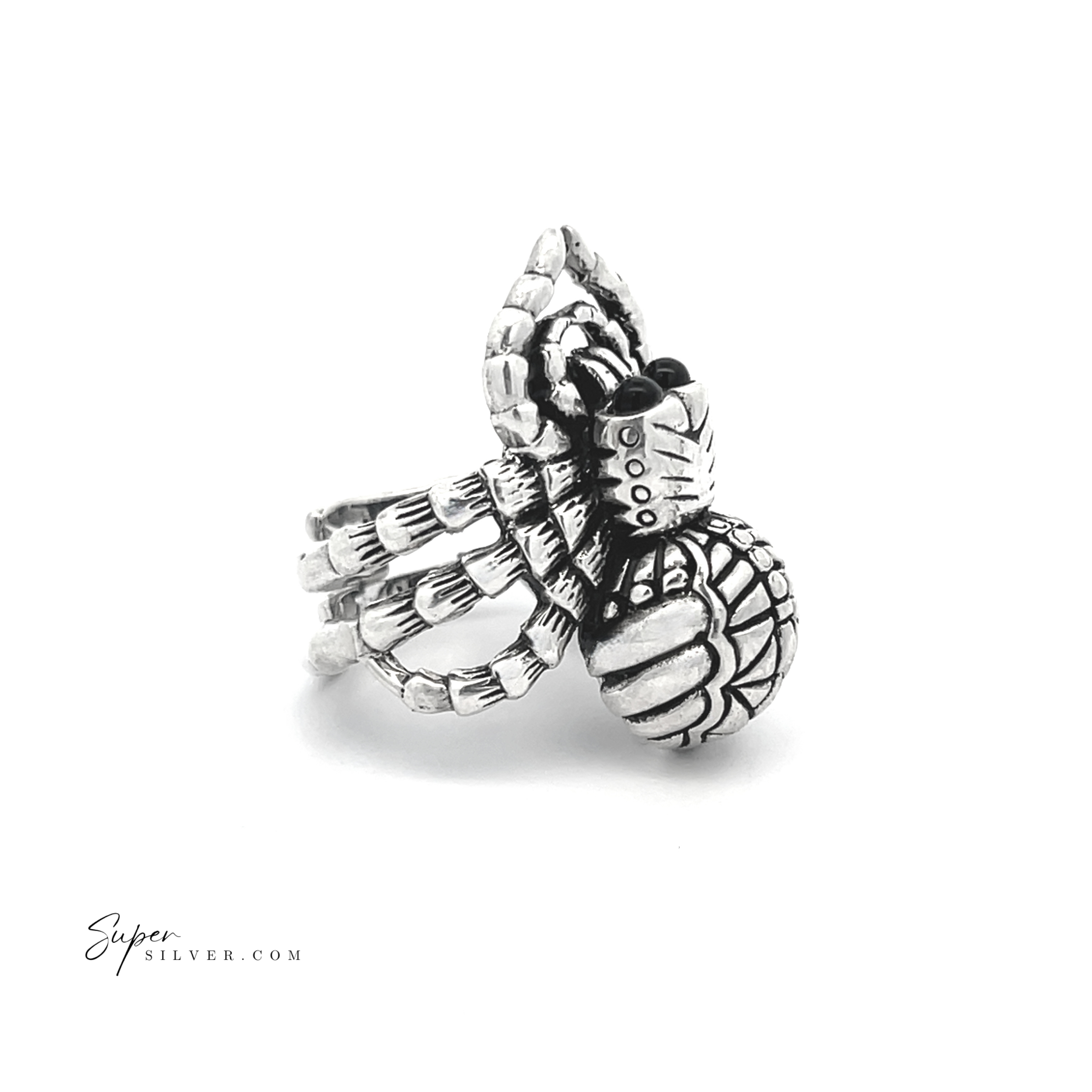 Adjustable Statement Spider Ring crafted in sterling silver features intricately detailed, textured legs and body, set against a white background to highlight the artistry of handcrafted jewelry.