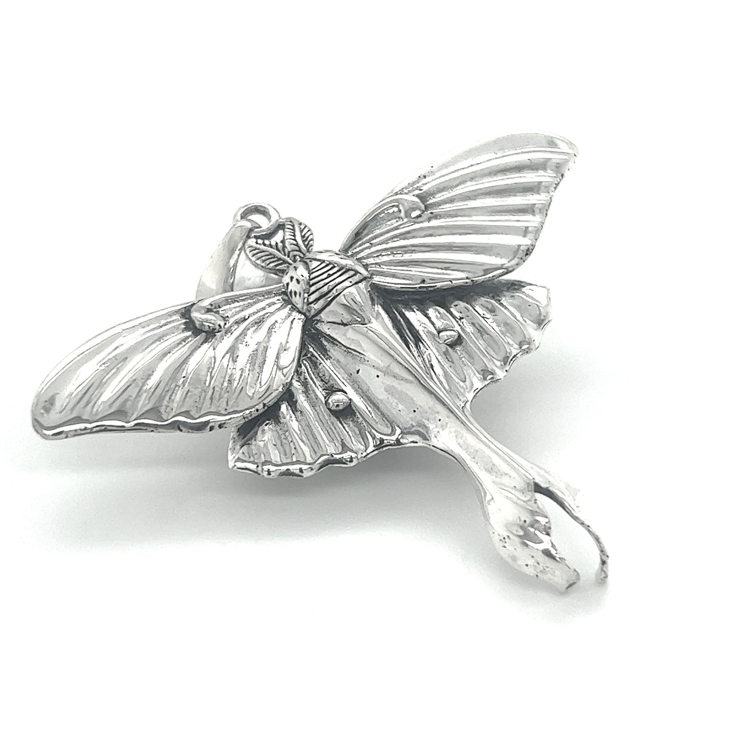 
                  
                    A Super Silver Statement Lunar Moth pendant on a white background, showcasing ethereal beauty and transformation.
                  
                
