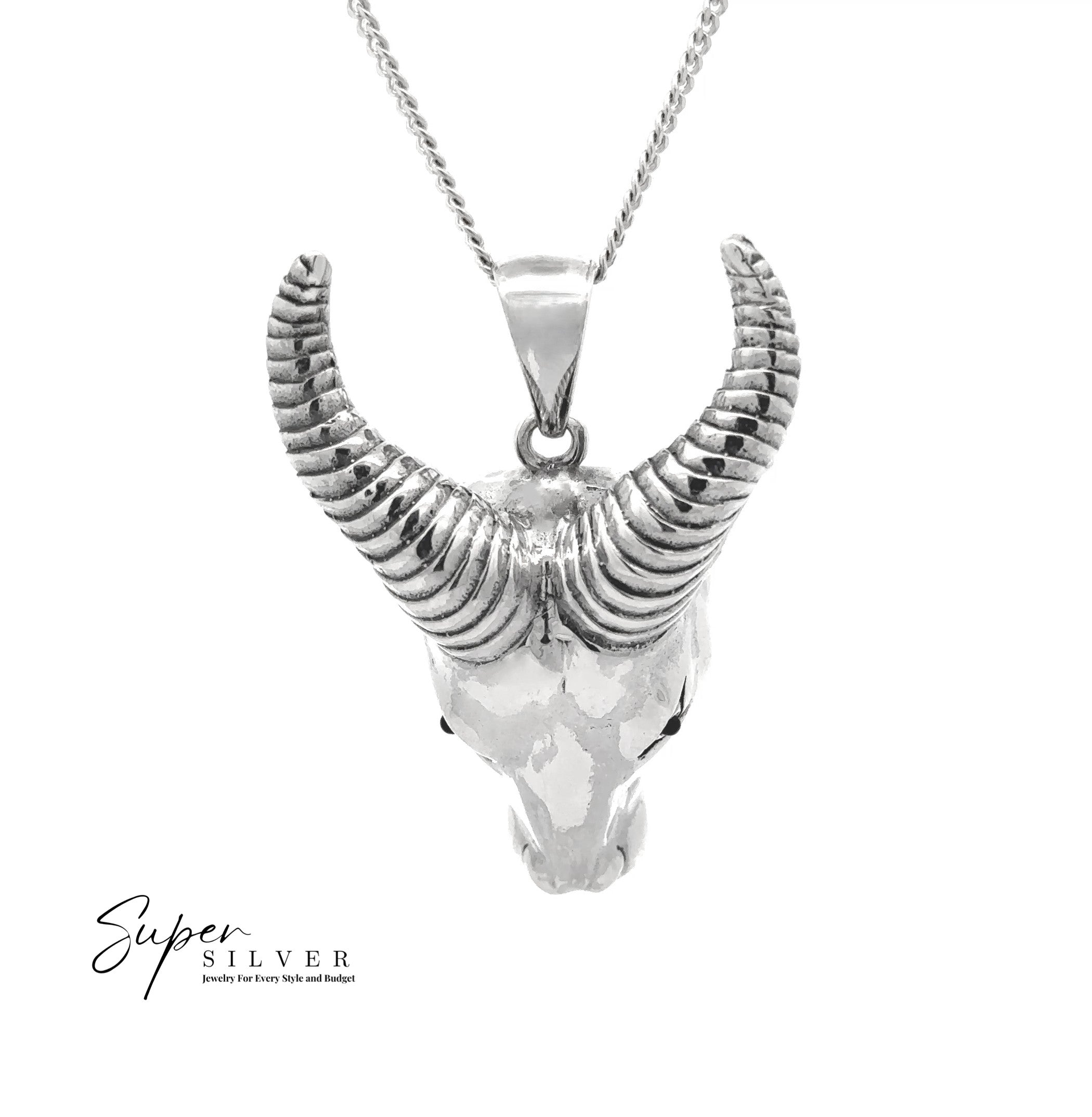 The Ram Statement Pendant is a silver necklace with a detailed ram skull and large curved horns, ideal for gothic jewelry fans. Shown on a white background with the "Super Silver" logo in the corner.