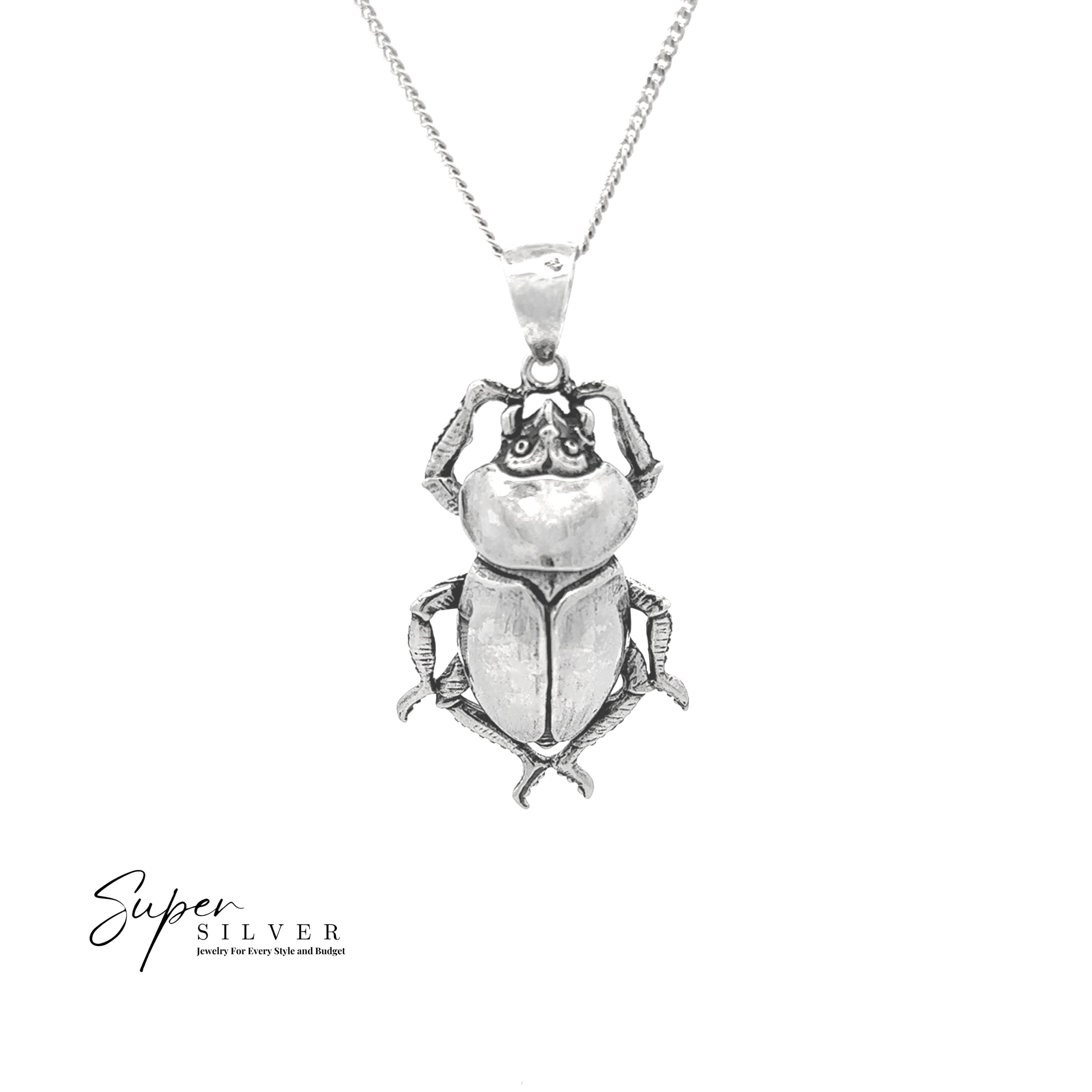 Beetle Pendant in sterling silver on a chain, shown against a white background. The "Super Silver" logo appears in the lower left corner, evoking the elegance of classic Egyptian jewelry.