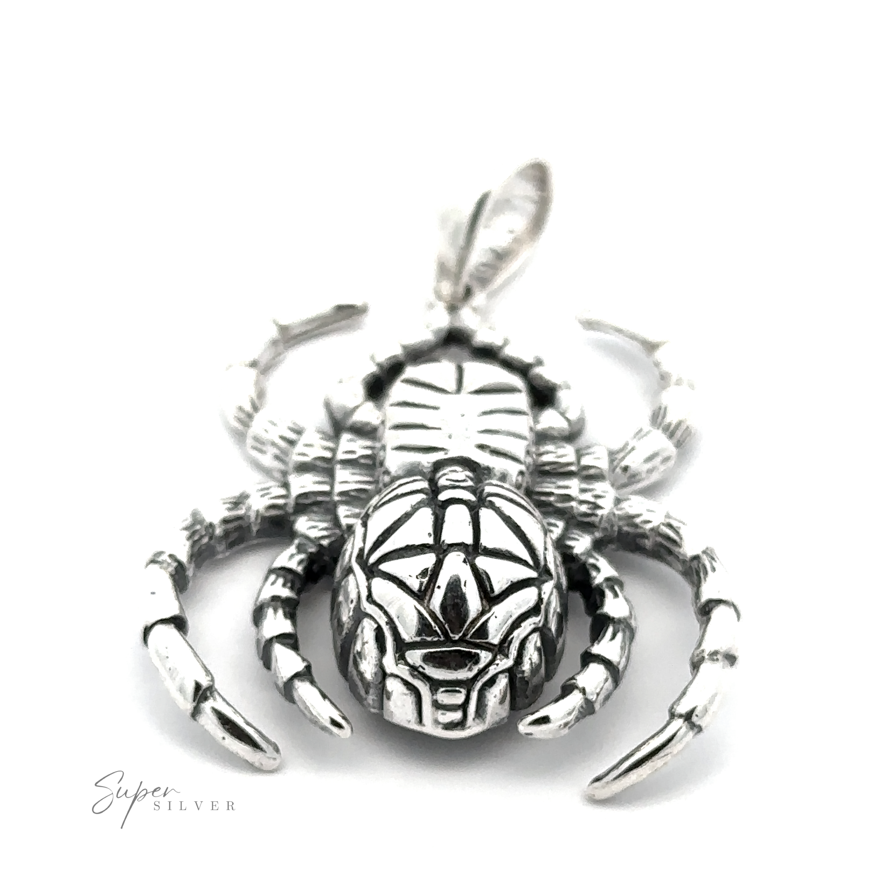 A Large Spider Pendant with intricate detailing, featuring a loop at the top for attaching to a chain. This elegant piece of handcrafted jewelry is made from .925 Sterling Silver. The text "Super Silver" is visible at the bottom left of the image.