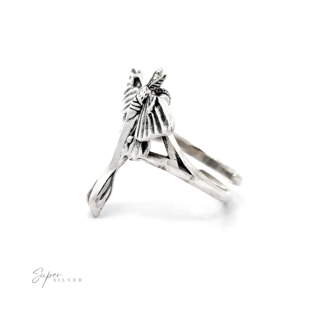 
                  
                    Statement Lunar Moth Ring displayed on a white background with a clear "super silver" signature below.
                  
                