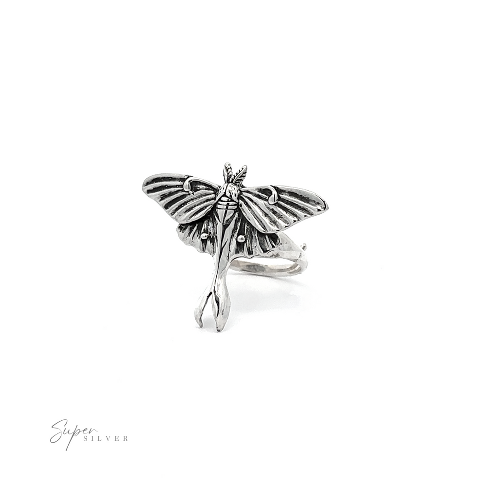 
                  
                    Statement Lunar Moth Ring designed to look like a lunar moth, displayed against a white background with a "super silver" signature in the corner.
                  
                