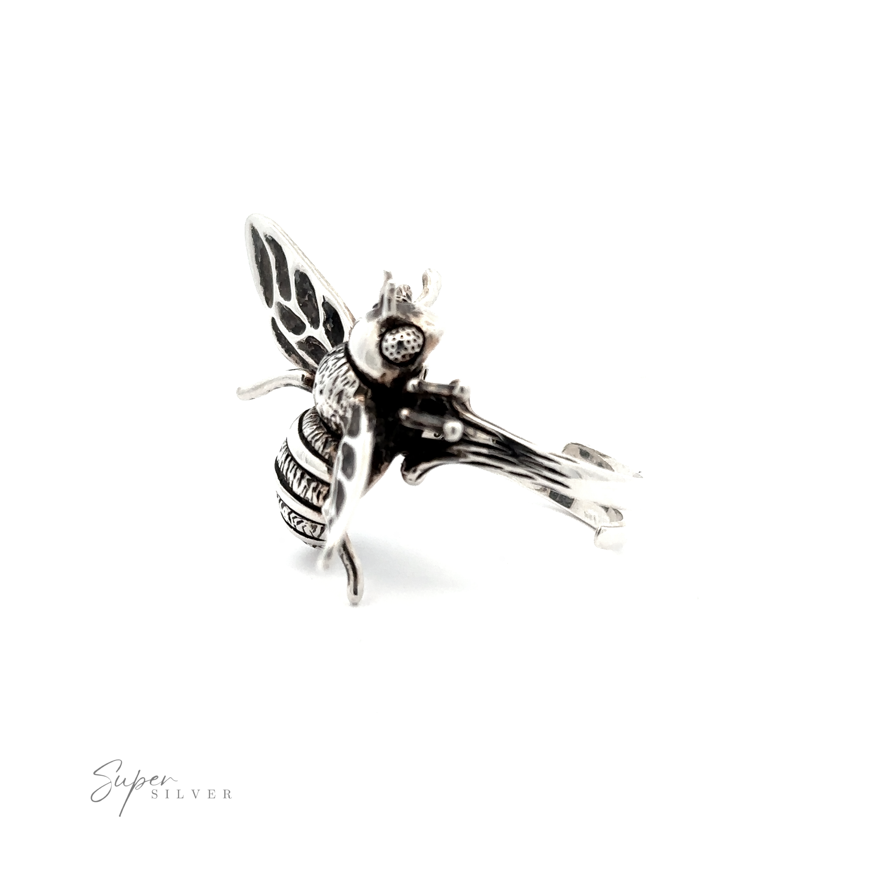 A Large Bee Ring made from .925 silver, designed in the shape of an intricately detailed bee with its wings and body elevated. The ring features an adjustable size band for a perfect fit.