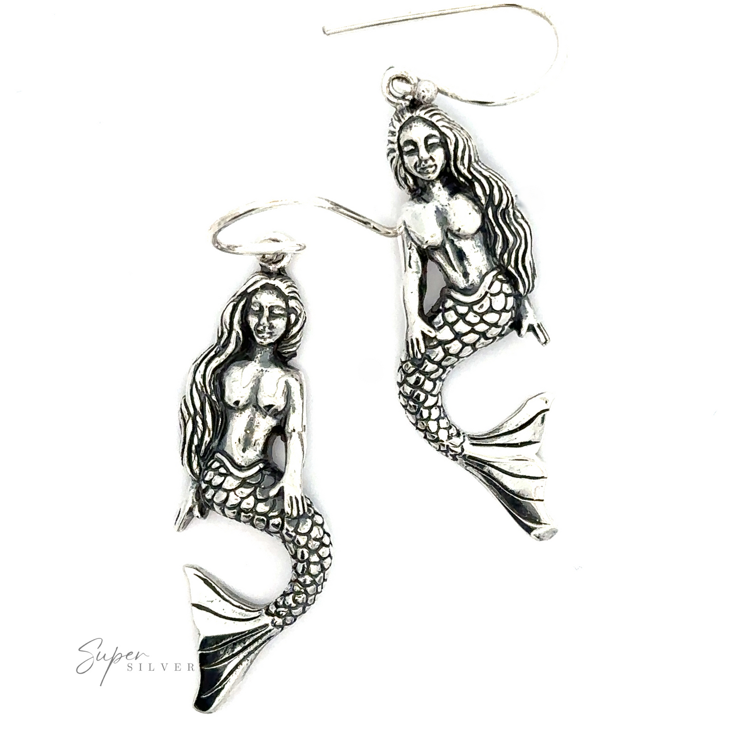 
                  
                    Sitting Mermaid Earrings with intricate details, displayed on a white background.
                  
                