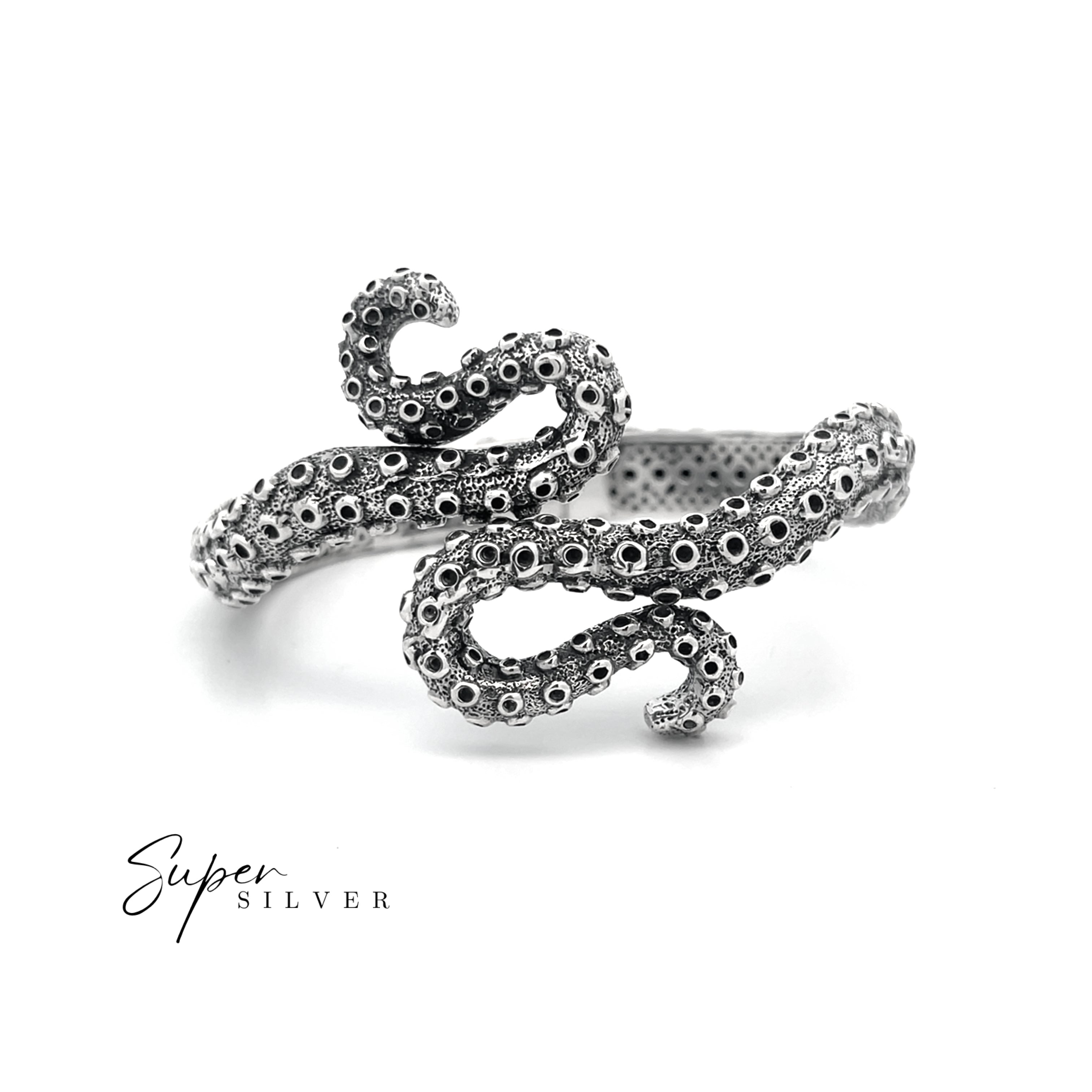 The Tentacle Hinge Cuff is a sterling silver bracelet crafted to mimic an octopus tentacle, shown on a white background with "Super Silver" in the corner—an exquisite piece of artisan jewelry.