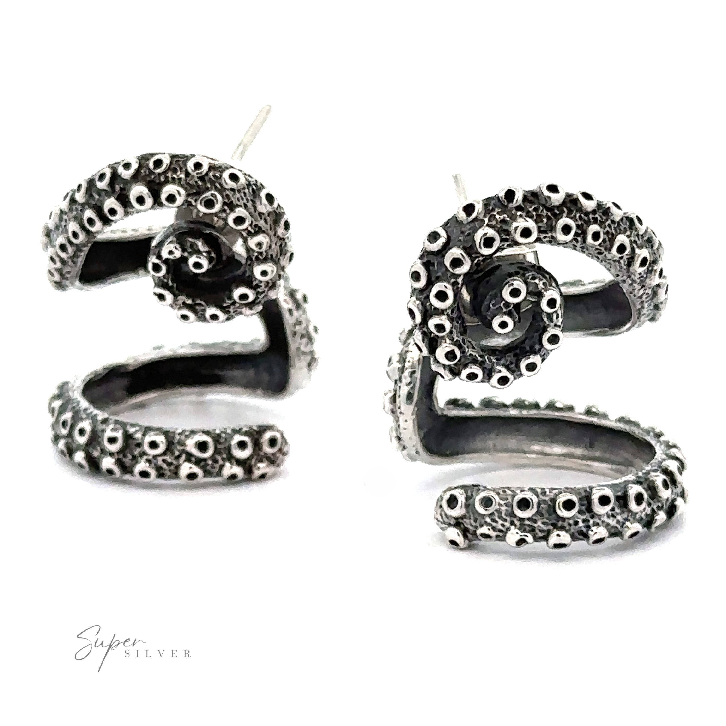 Handcrafted Curled Tentacle Earrings with intricate suction cup details, displayed against a plain white background. This exquisite ocean allure jewelry captures the essence of marine elegance perfectly.