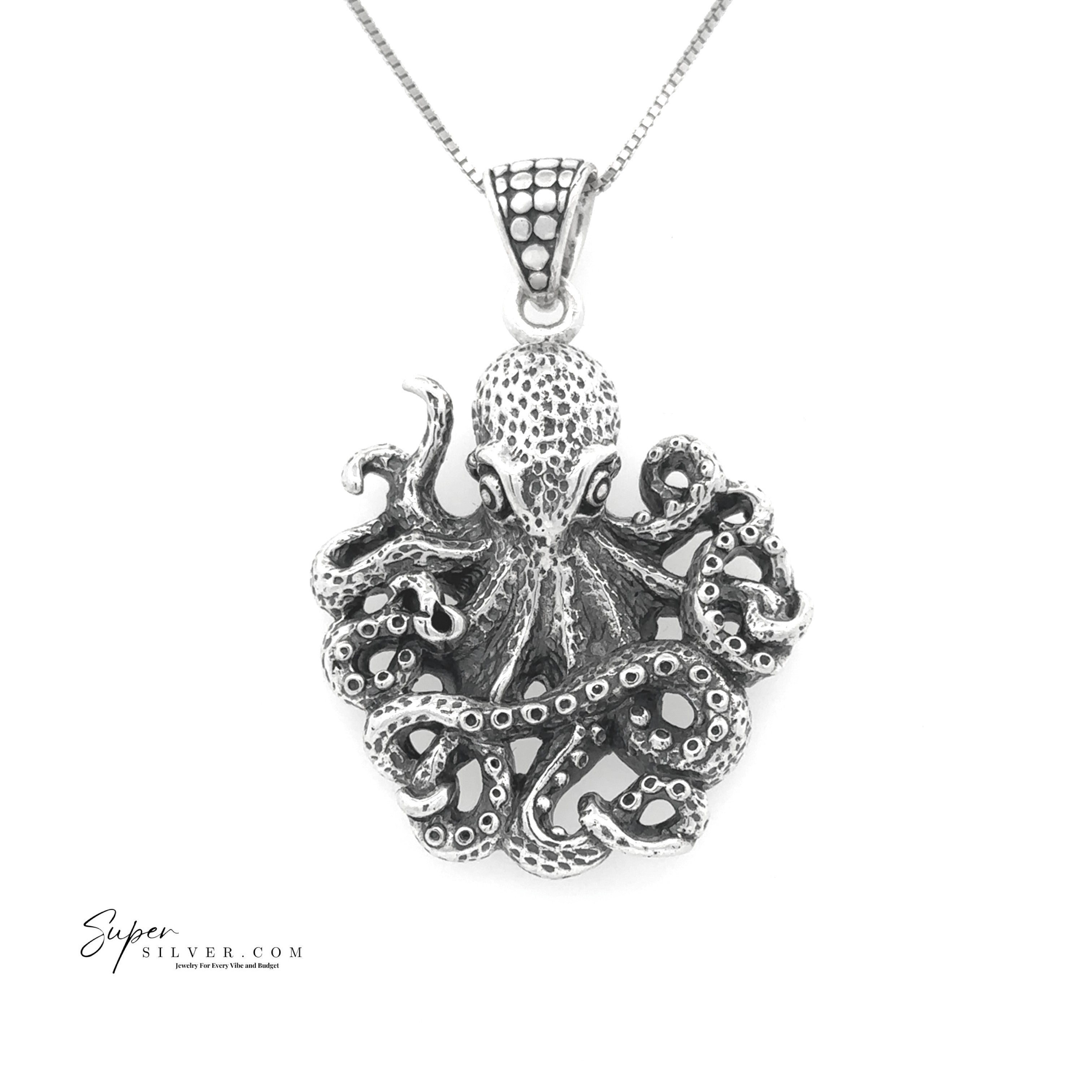 The Legends of the Deep Octopus Pendant is a sterling silver necklace featuring an intricately detailed octopus design, with lifelike tentacles gracefully hanging from a chain.