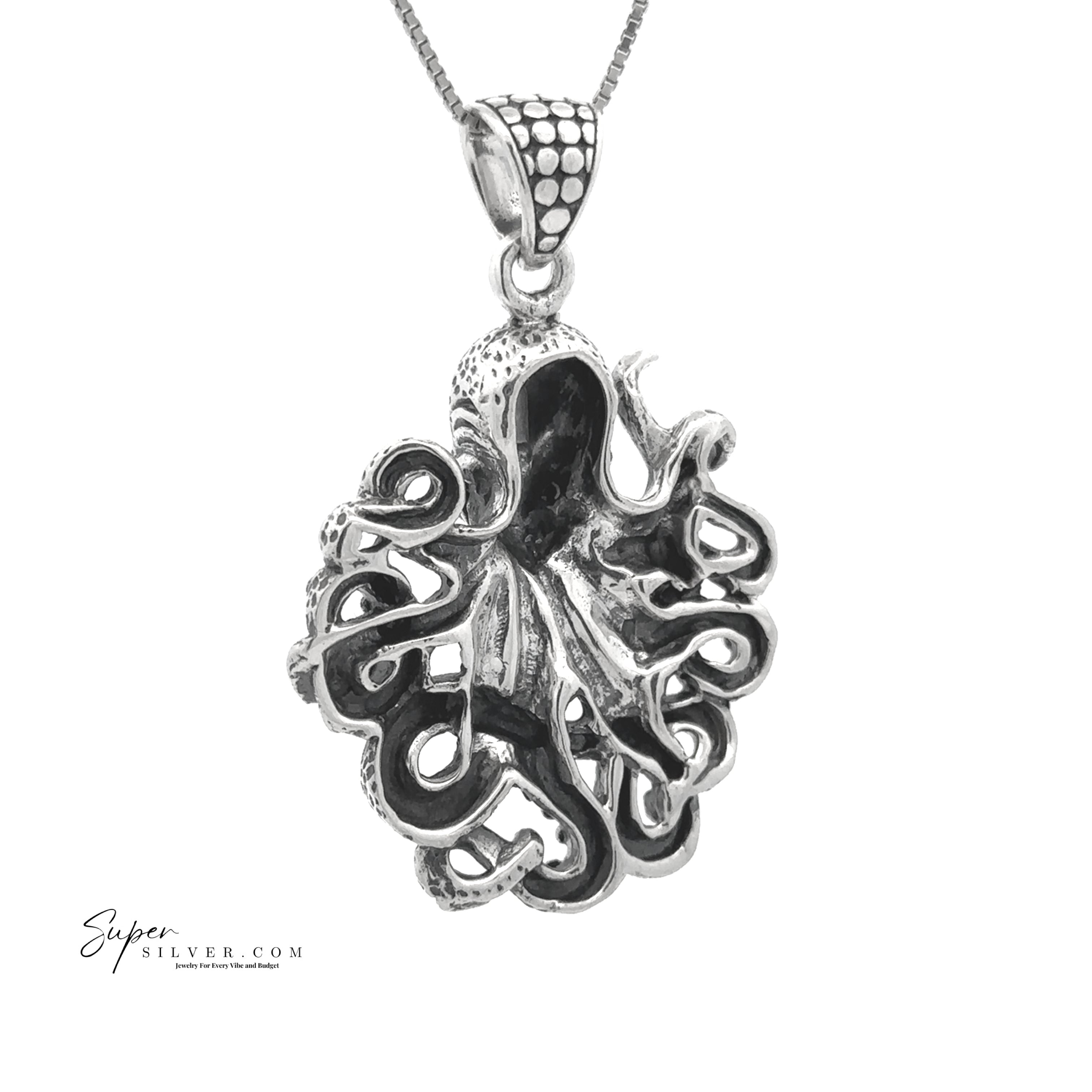 The Legends of the Deep Octopus Pendant, crafted in sterling silver with detailed tentacles, hangs from a chain and creates a unique ocean-inspired necklace, showcased against a white background.