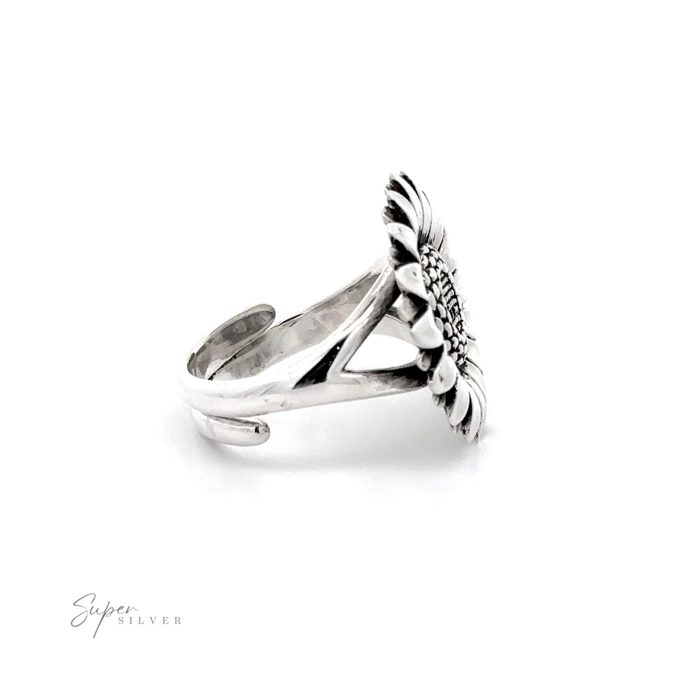 
                  
                    A silver ring featuring an intricate sunflower design that wraps around the band, displayed on a white background with the logo "super silver" at the bottom.
                  
                