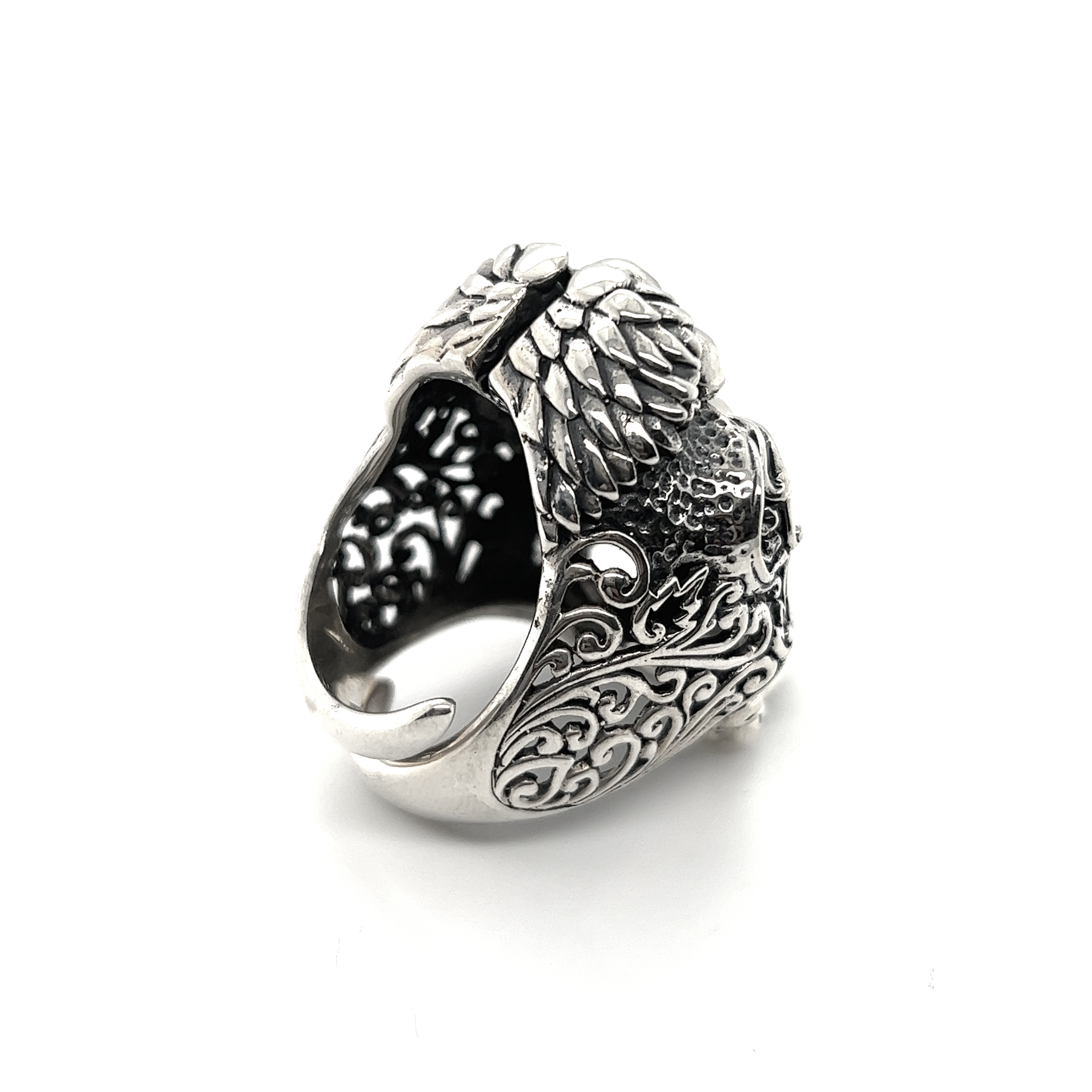 A silver Exquisite Skull Ring with an ornate designer design.