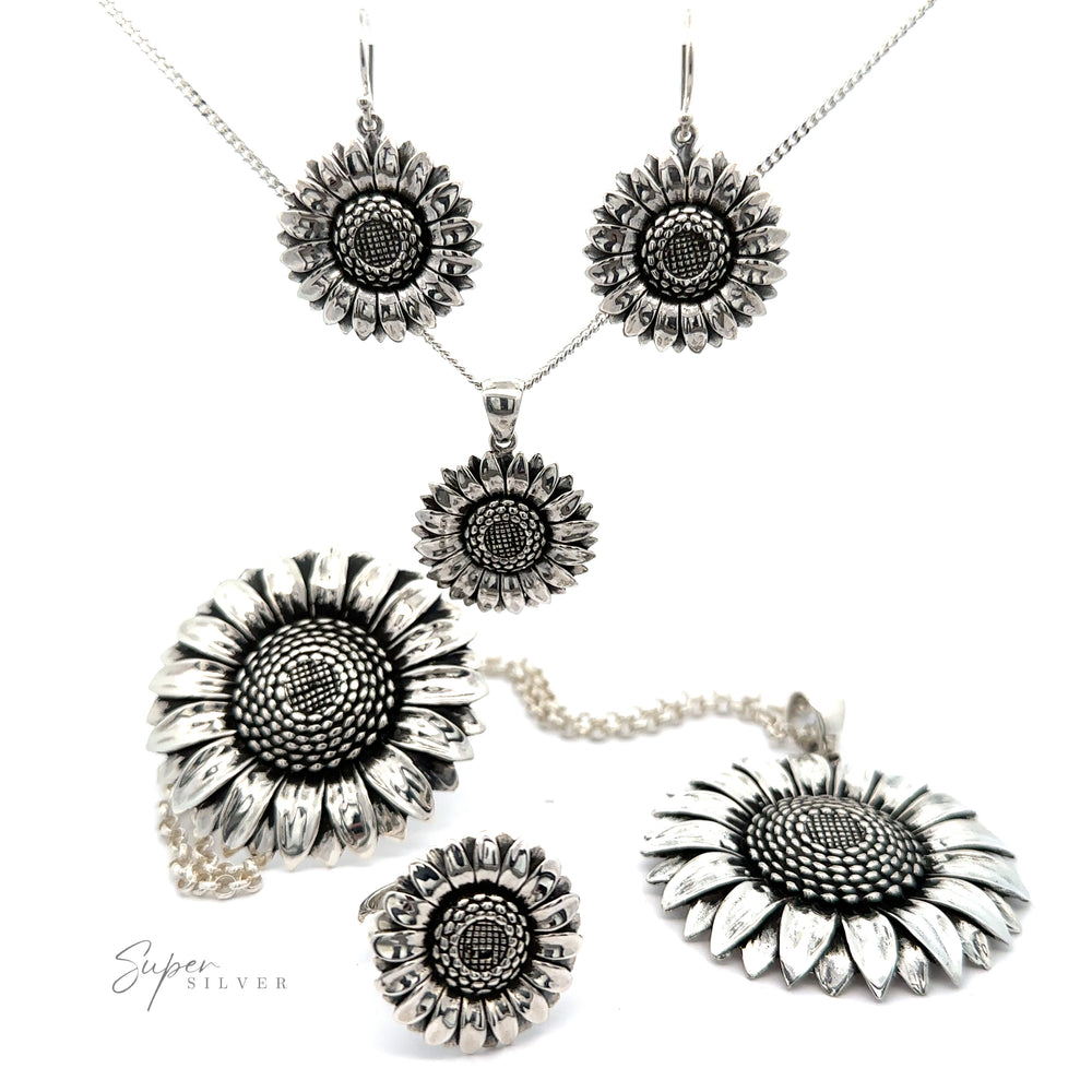 
                  
                    Silver Sunflower Pendants-themed oxidized silver jewelry set including a necklace, bracelet, and earrings displayed against a white background.
                  
                
