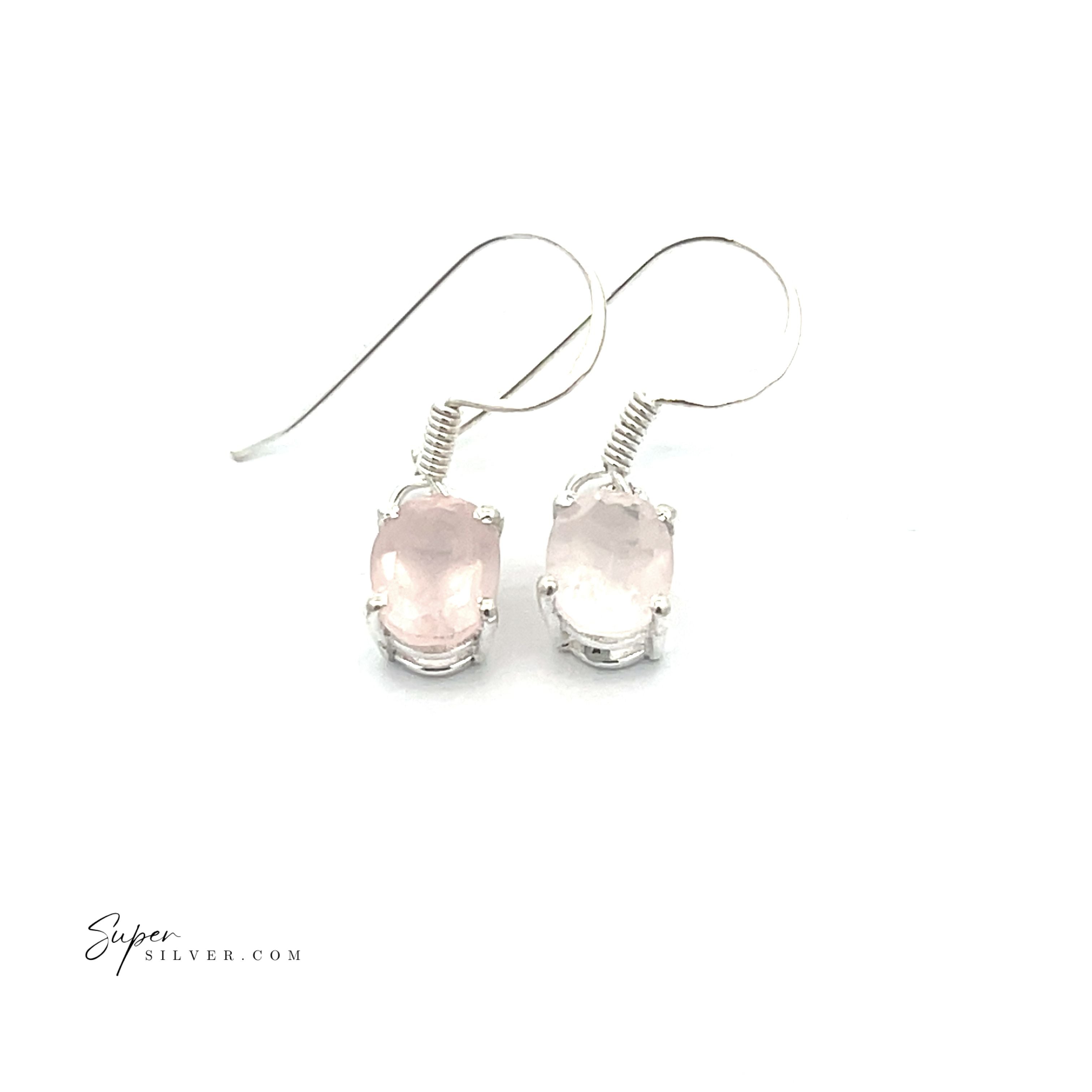 The Brilliant Oval Gemstone Earrings are sterling silver with light pink oval gems, shown on a white background.