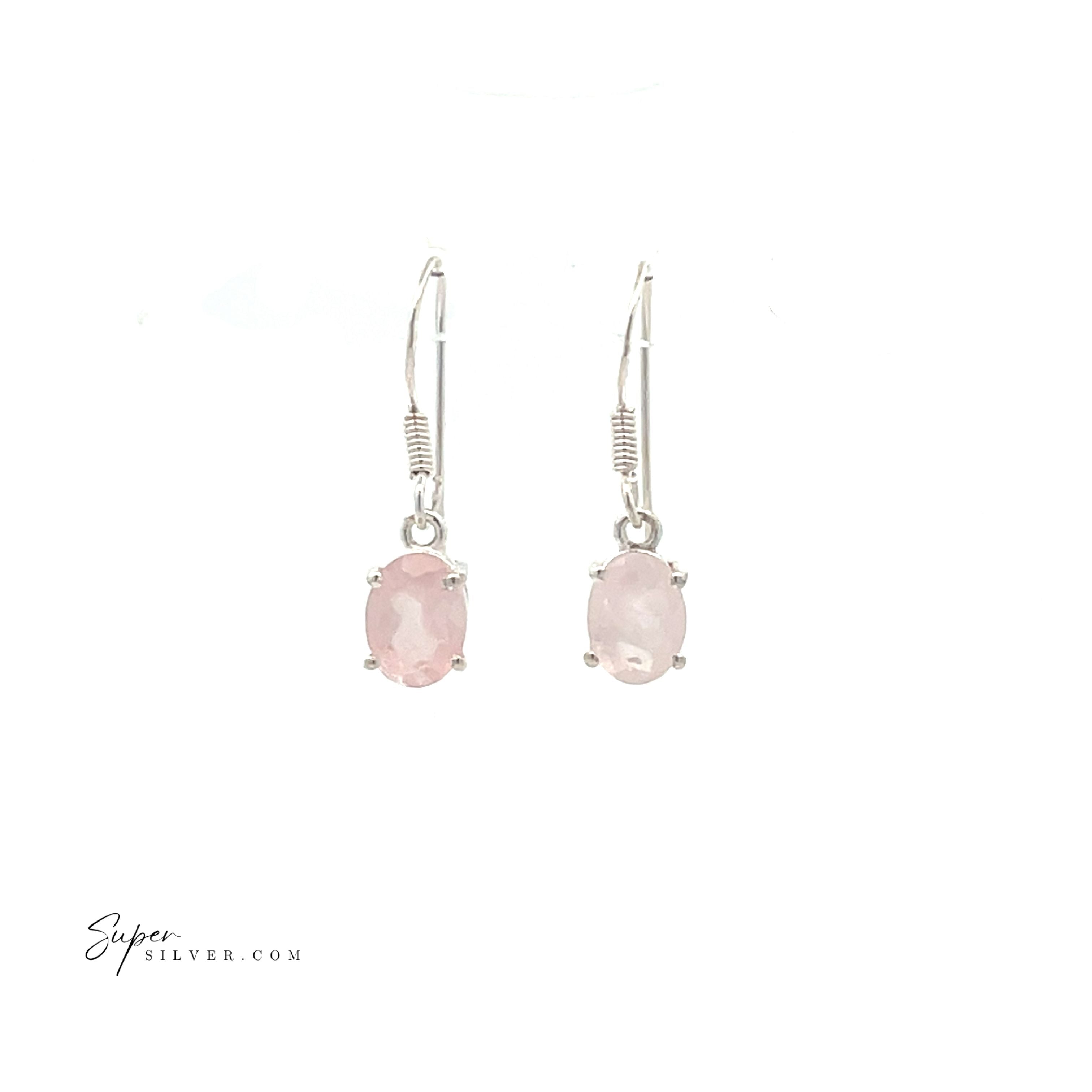 Brilliant Oval Gemstone Earrings—sterling silver dangle earrings featuring oval pale pink gemstones on a white background, ideal for adding subtle elegance to any outfit.