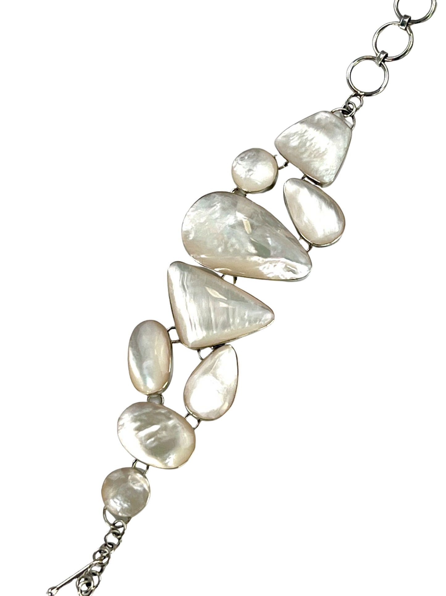 
                  
                    A luminous white Statement Mother of Pearl Bracelet on a Super Silver chain.
                  
                