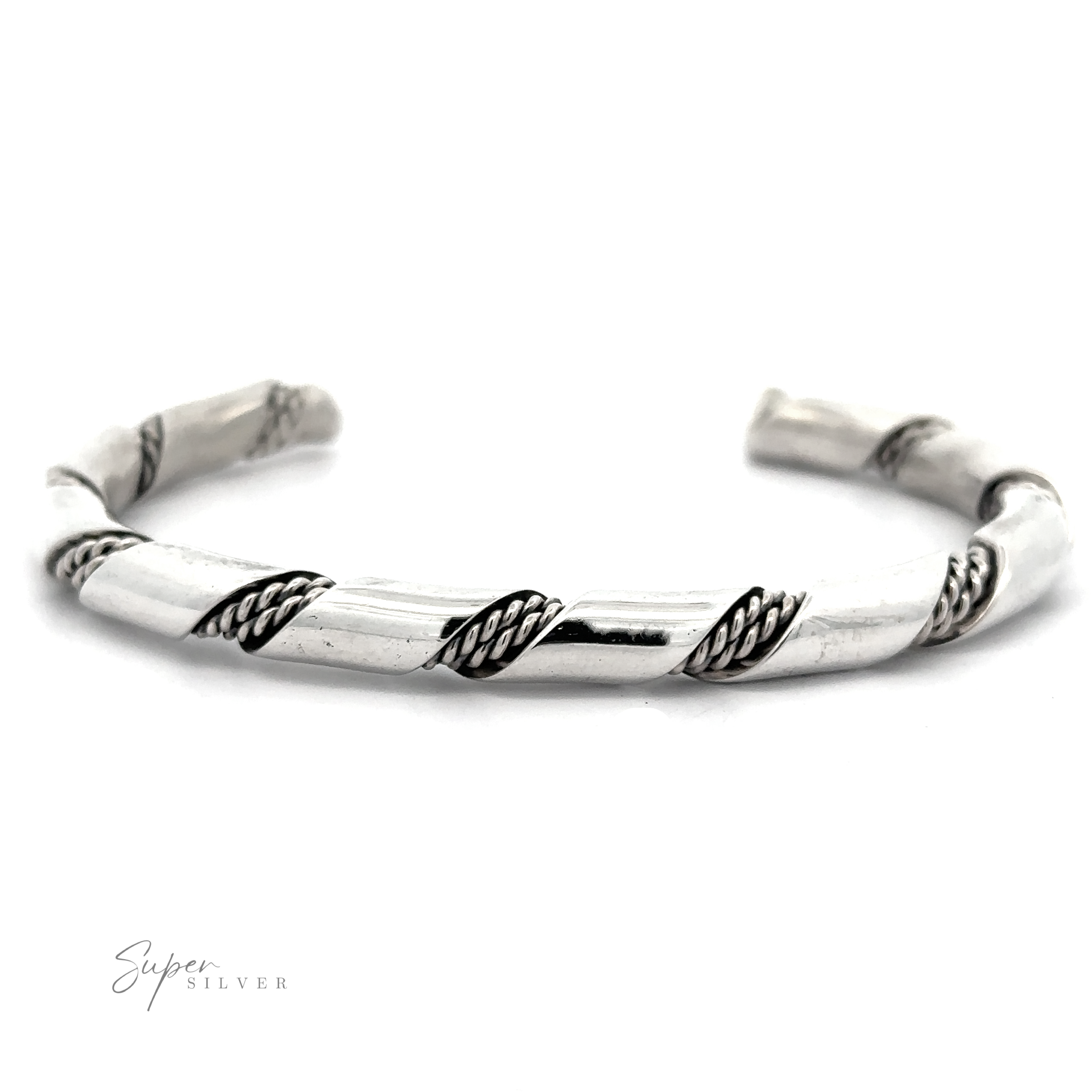 Native American Handmade Thick Silver Twist Cuff with a twisted rope design, featuring alternating smooth and textured sections. Crafted from authentic sterling silver, the cuff is slightly open at one end and has a polished finish. "Super Silver" is engraved at the bottom left.