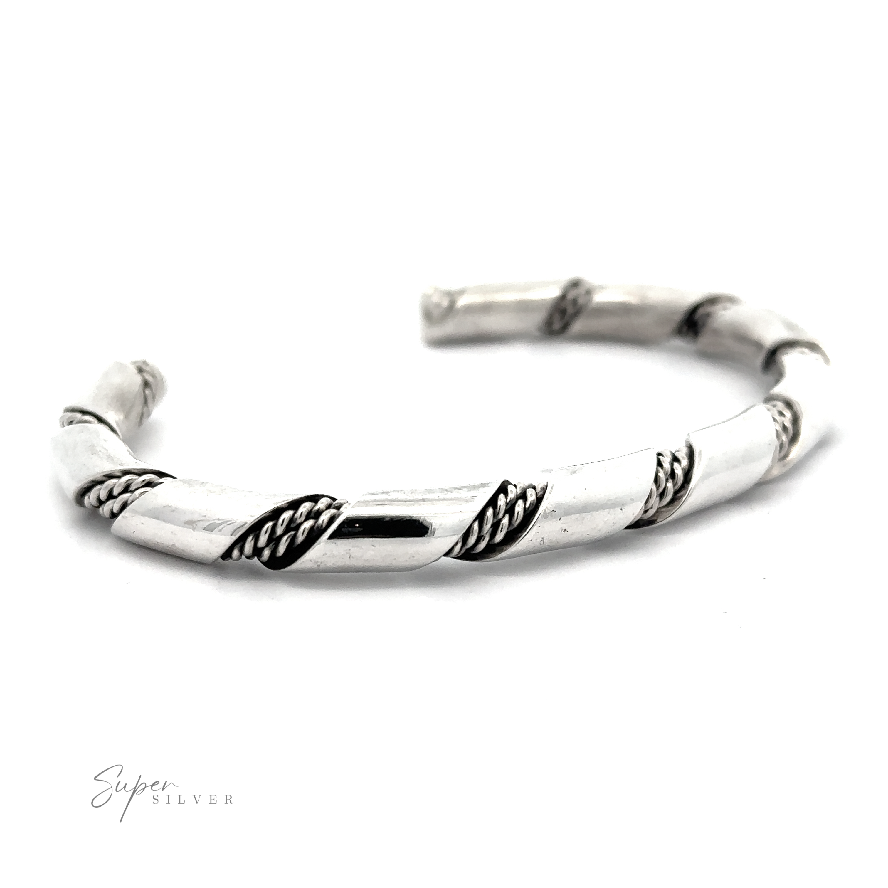 Native American Handmade Thick Silver Twist Cuff with twisted rope detailing on one side. The bracelet is open-ended, featuring a polished finish. This stunning statement piece carries a touch of Native American influence.