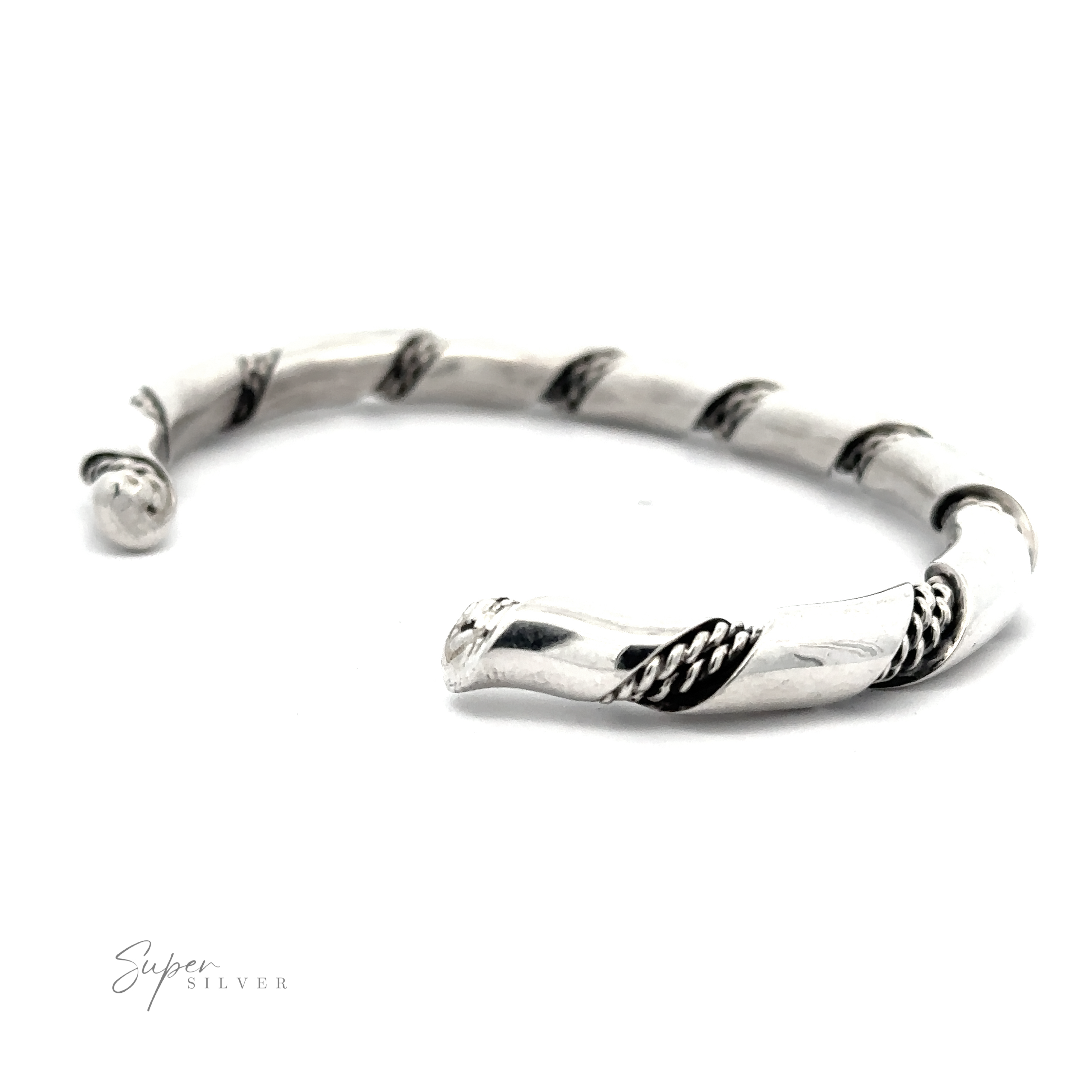 A Native American Handmade Thick Silver Twist Cuff with a minimalist design, featuring a mix of polished and textured sections. Brand name "Super Silver" is visible at the corner, making this an elegant statement piece.
