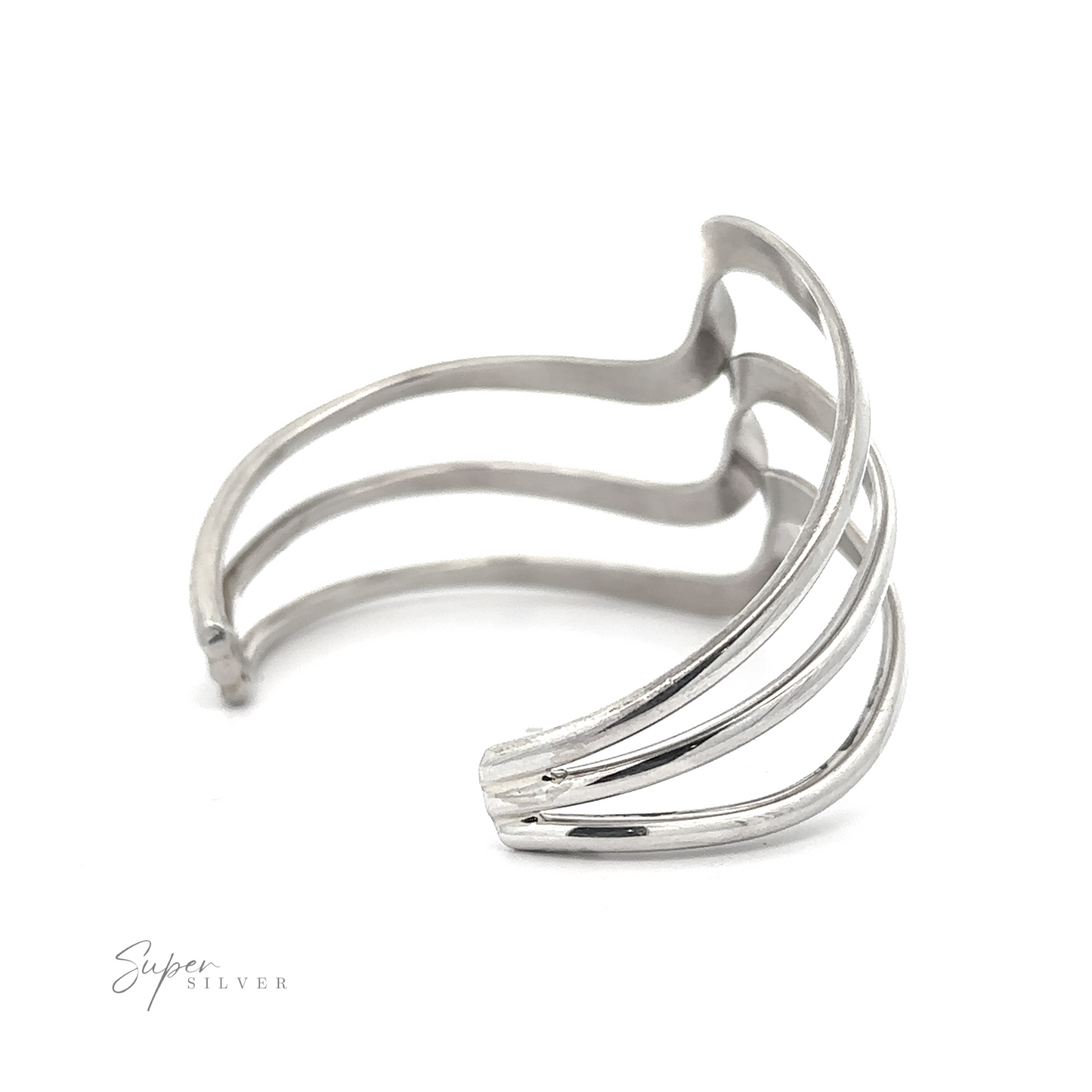 
                  
                    A Native American Handmade Silver Triple Wave Cuff with three parallel bands and a subtle wave design, fitting a 6-7 inch wrist. The brand name "Super Silver" is visible in the lower left corner.
                  
                