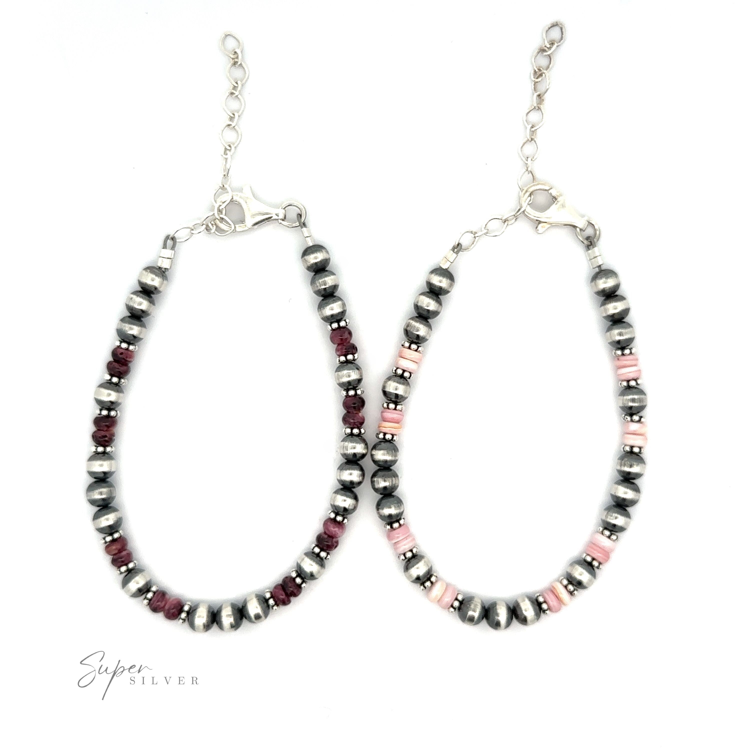 A pair of oval-shaped, handmade earrings featuring alternating beads in silver, black, and Spiny Oyster Shell colors, displayed on a white background.