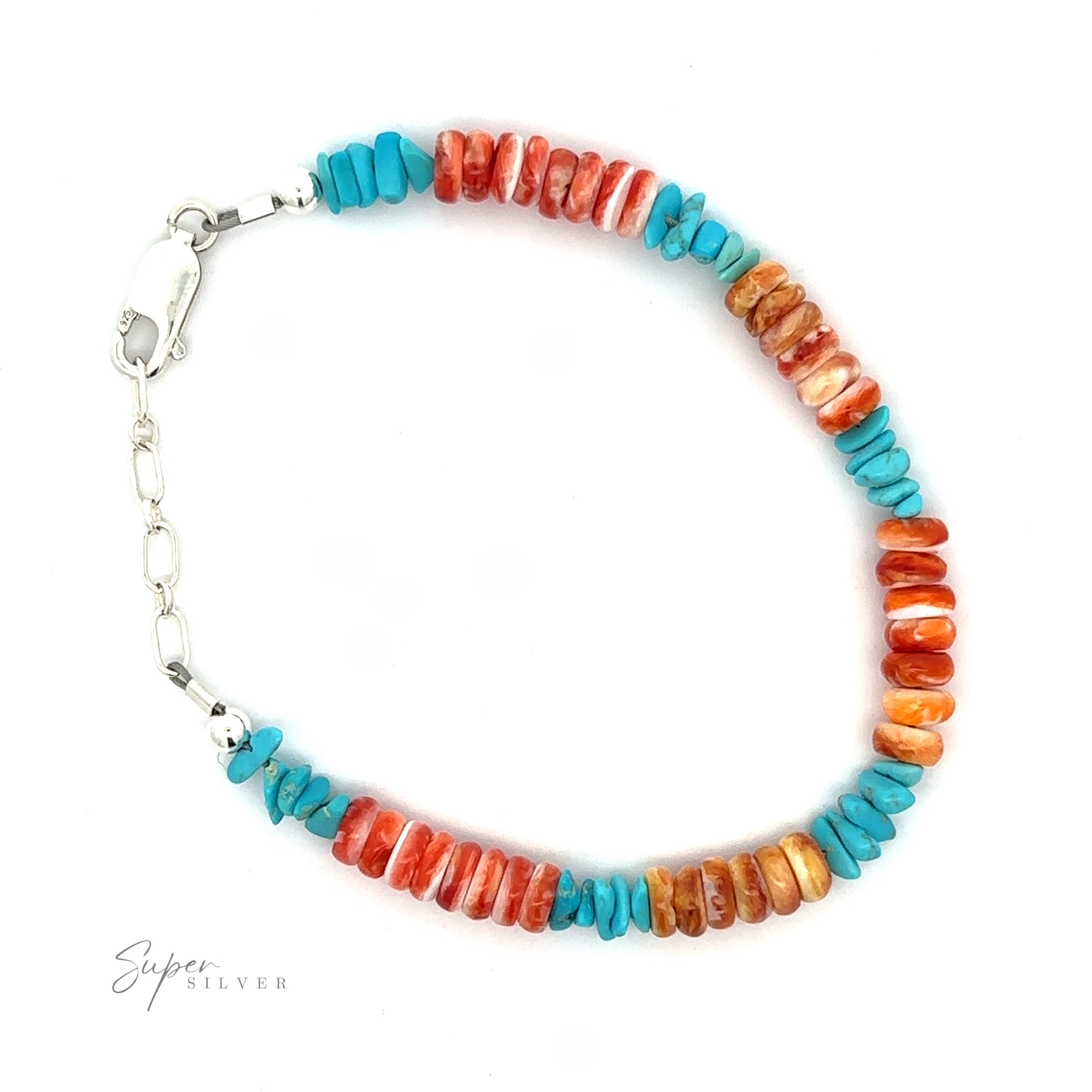 A Native American Turquoise and Spiny Oyster Shell bracelet, secured with a silver clasp, on a white background.