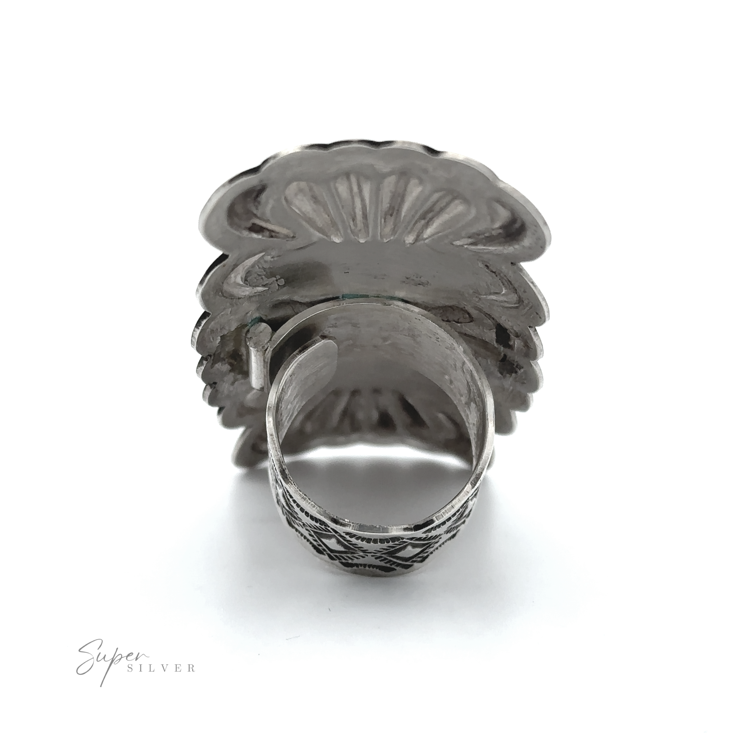 The Blush and Thunder Ring is a sterling silver piece with an ornate, scalloped top, shown from the back on a white background. "Super Silver" appears in the lower left—a classic nod to Native American jewelry craftsmanship.