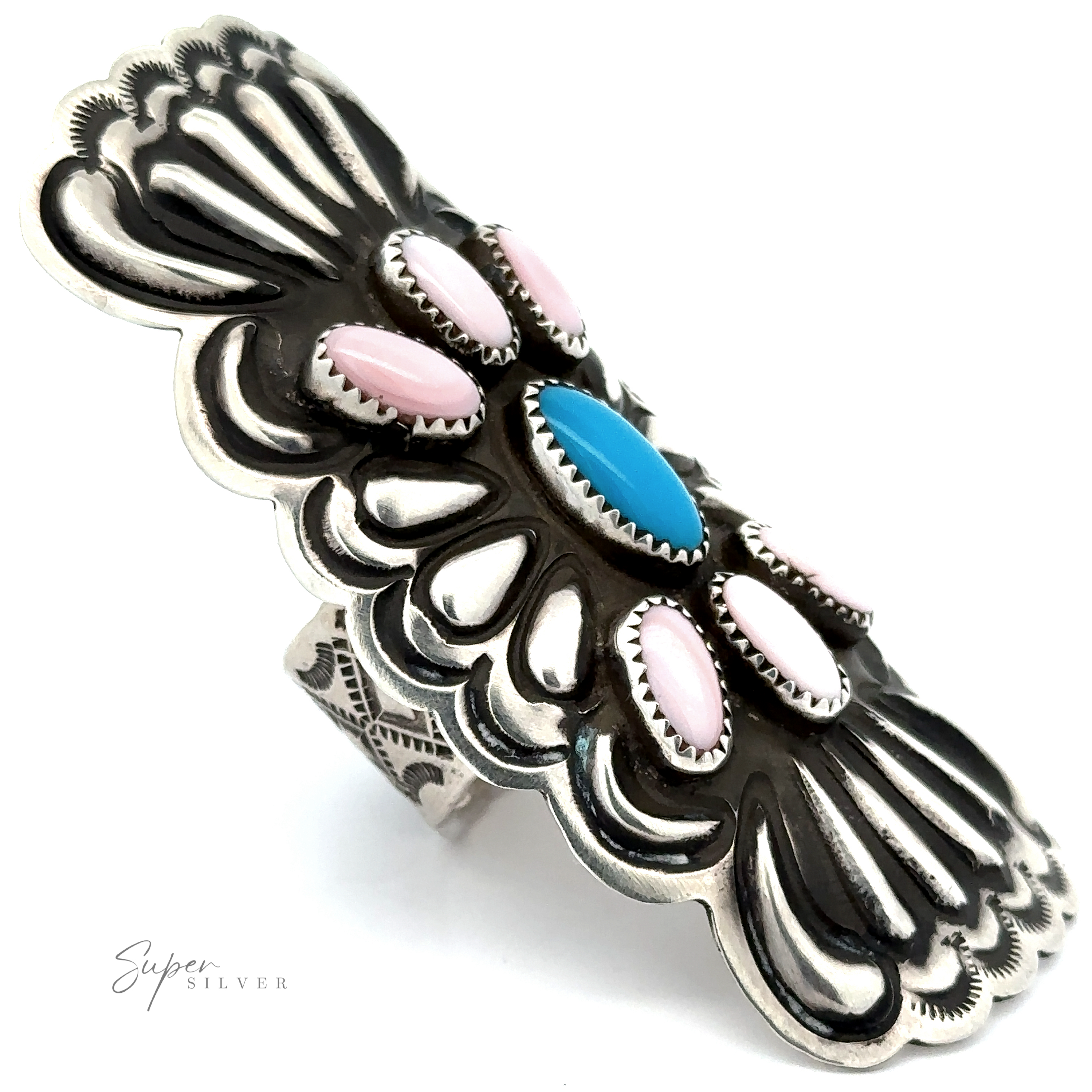The Blush and Thunder Ring is a wide sterling silver band with engraved patterns, pink and blue oval stones in a floral design inspired by Native American jewelry. A "Super Silver" watermark appears in the corner.