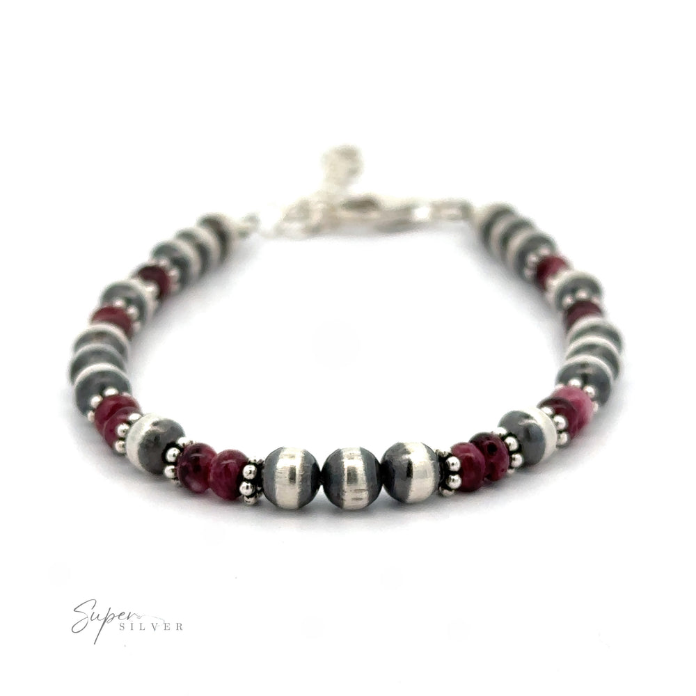 
                  
                    Native American Shell and Navajo Pearl Bracelet with red and gray accents, displayed on a plain white background.
                  
                