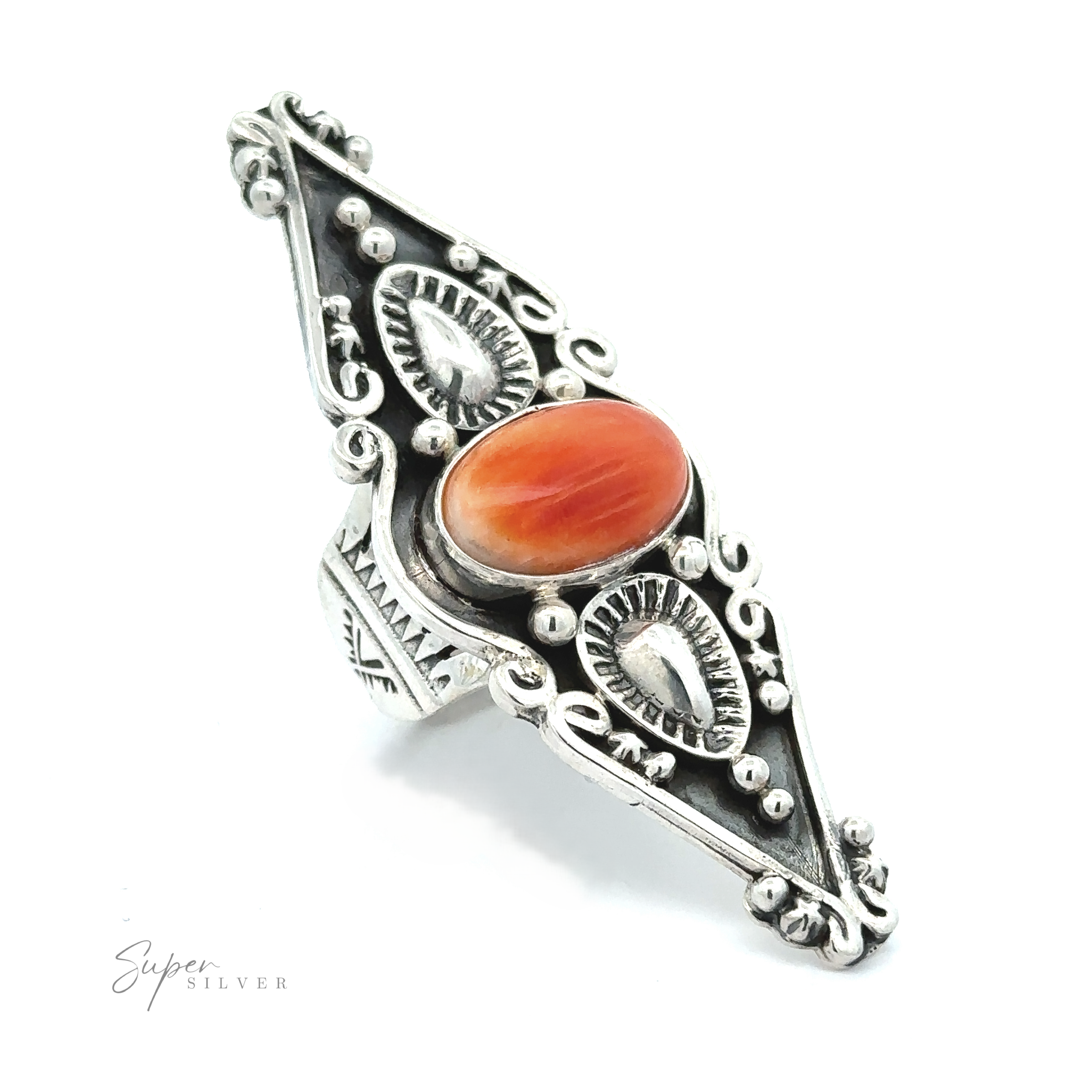 Stunning Native American Statement Ring featuring intricate Southwest artistry and a central turquoise gem, displayed against a white background.