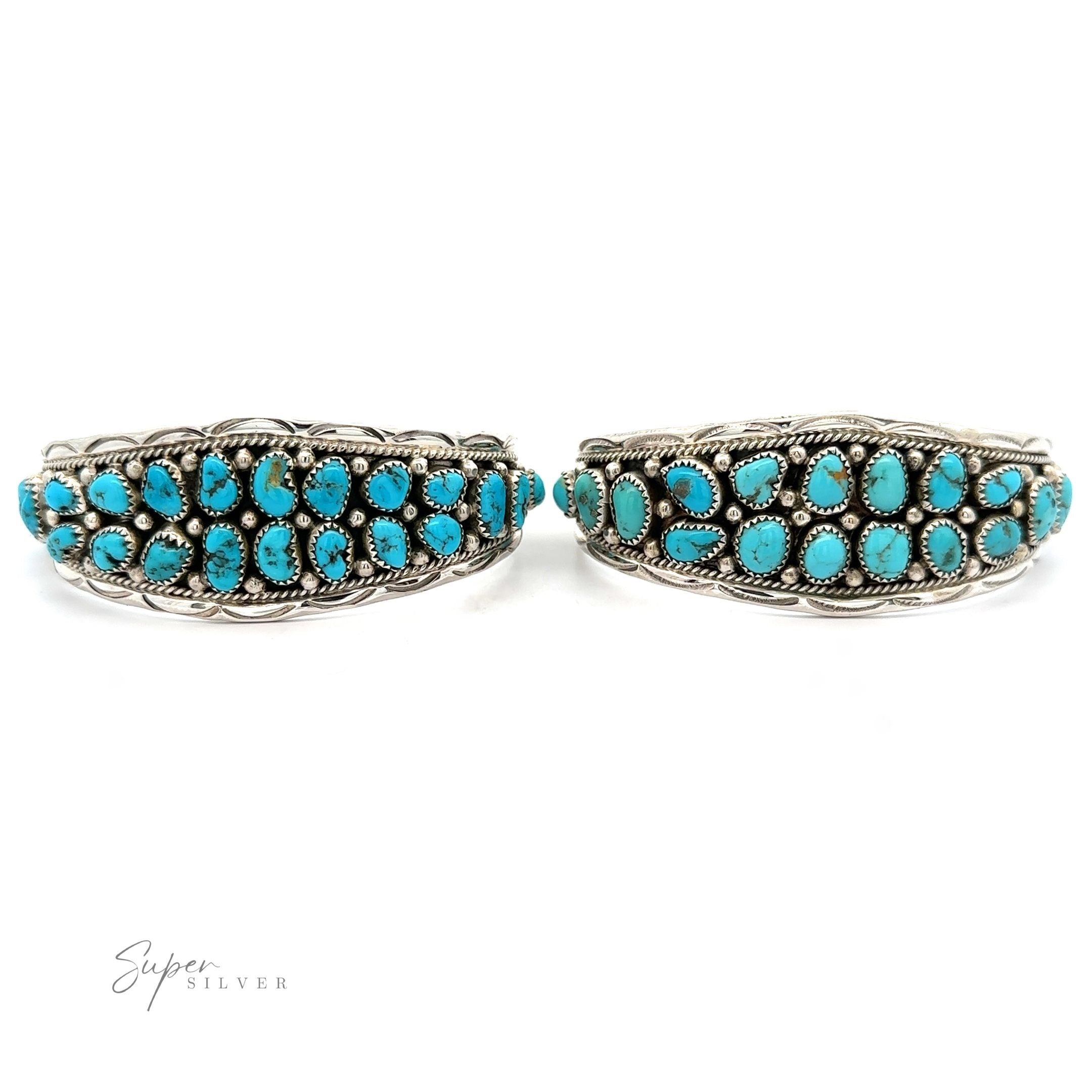 A pair of Native American Cluster Turquoise cuff bracelets, showcasing Southwest charm, displayed against a white background.